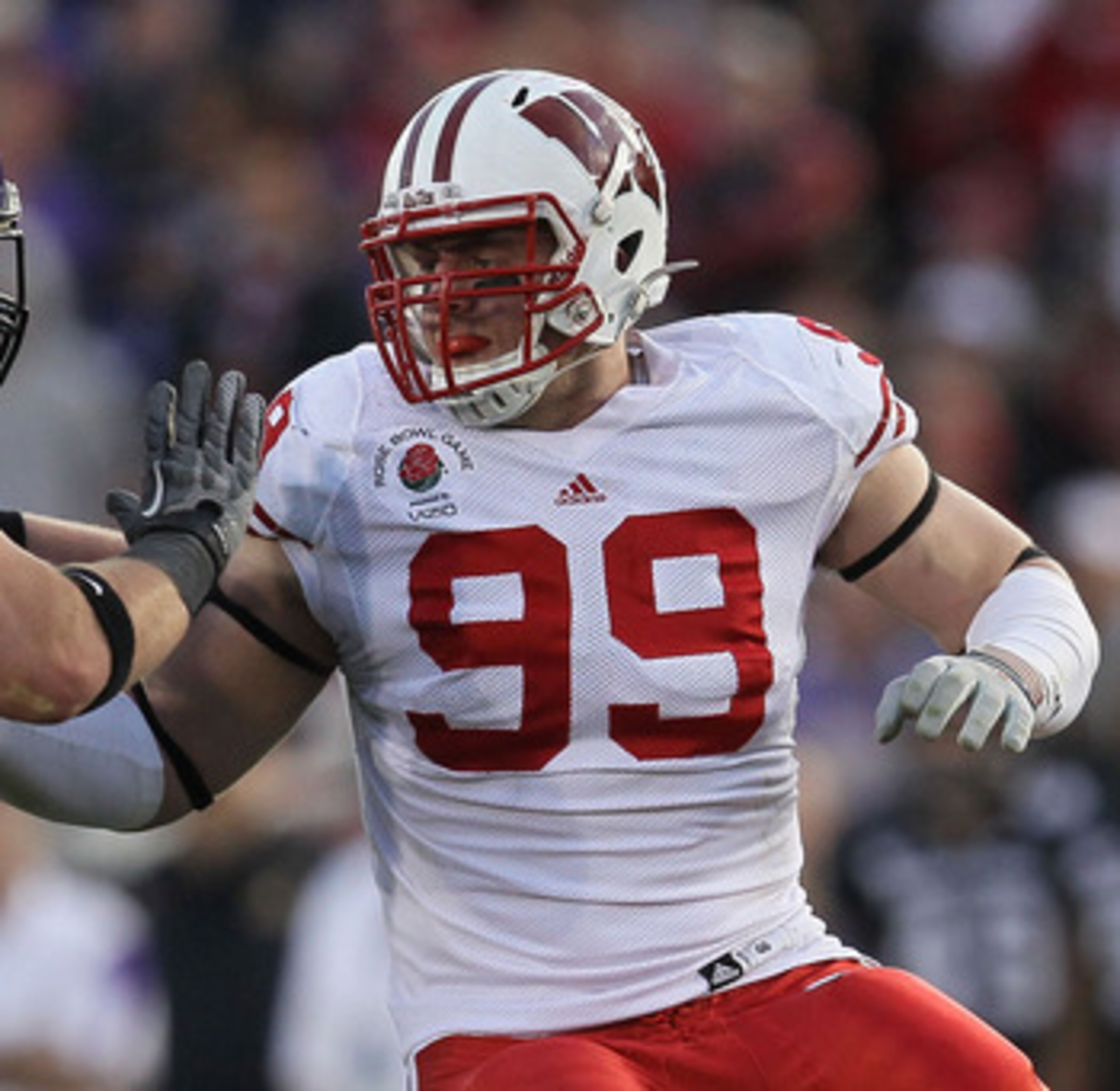 PASADENA, CA - JANUARY 01: Defensive lineman J.J. Watt #99 of the Wisconsin Badgers rushes the TCU Horned Frogs in the 97th Rose Bowl game on January 1, 2011 in Pasadena, California. (Photo by Stephen Dunn/Getty Images) PASADENA, CA - JANUARY 01: Defensive lineman J.J. Watt #99 of the Wisconsin Badgers rushes the TCU Horned Frogs in the 97th Rose Bowl game on January 1, 2011 in Pasadena, California. (Photo by Stephen Dunn/Getty Images)