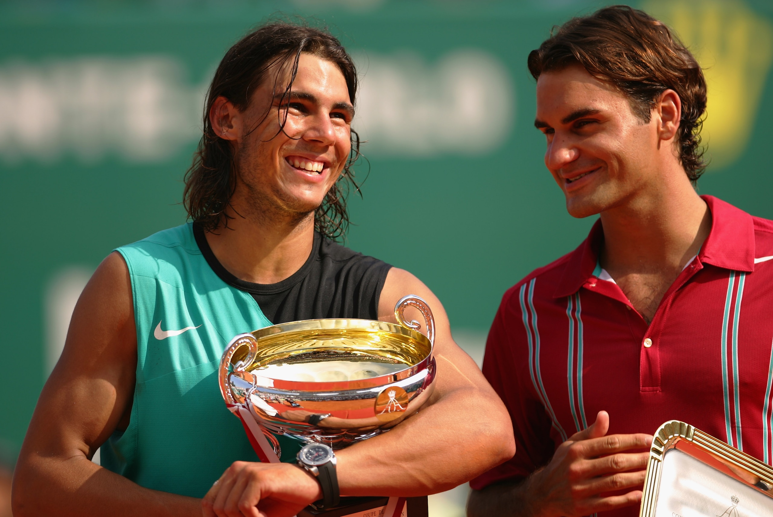 MONTE CARLO, MONACO - APRIL 22:  Rafael Nadal of Spain (L) laughs with Roger Federer of Switzerland on the podium after Nadal's victory by 6-4,6-4 during the Final on Day Six of the Masters Series at the Monte Carlo Country Club, April 22, 2007 in Monte C