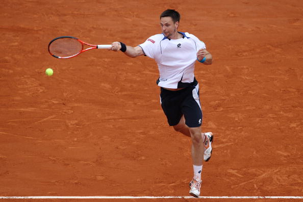 PARIS - JUNE 06:  Robin Soderling of Sweden plays a forehand during the men's singles final match between Robin Soderling of Sweden and Rafael Nadal of Spain on day fifteen of the French Open at Roland Garros on June 6, 2010 in Paris, France.  (Photo by C