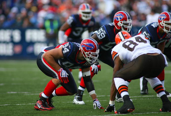 ORCHARD PARK, NY - OCTOBER 11:  Aaron Schobel #94 of the Buffalo Bills lines up on the outside against Robert Royal #84 of the Cleveland Browns during their NFL game at Ralph Wilson Stadium on October 11, 2009 in Orchard Park, New York. The Browns defeate