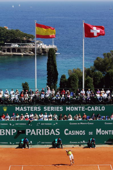 MONTE CARLO, MONACO - APRIL 23:  Rafael Nadal of Spain serves against Roger Federer of Switzerland in the final of the Rolex ATP Tennis Masters Monte Carlo at the The Monte Carlo Country Club on April 23, 2006 in Monte-Carlo, Monaco.  (Photo by Michael St