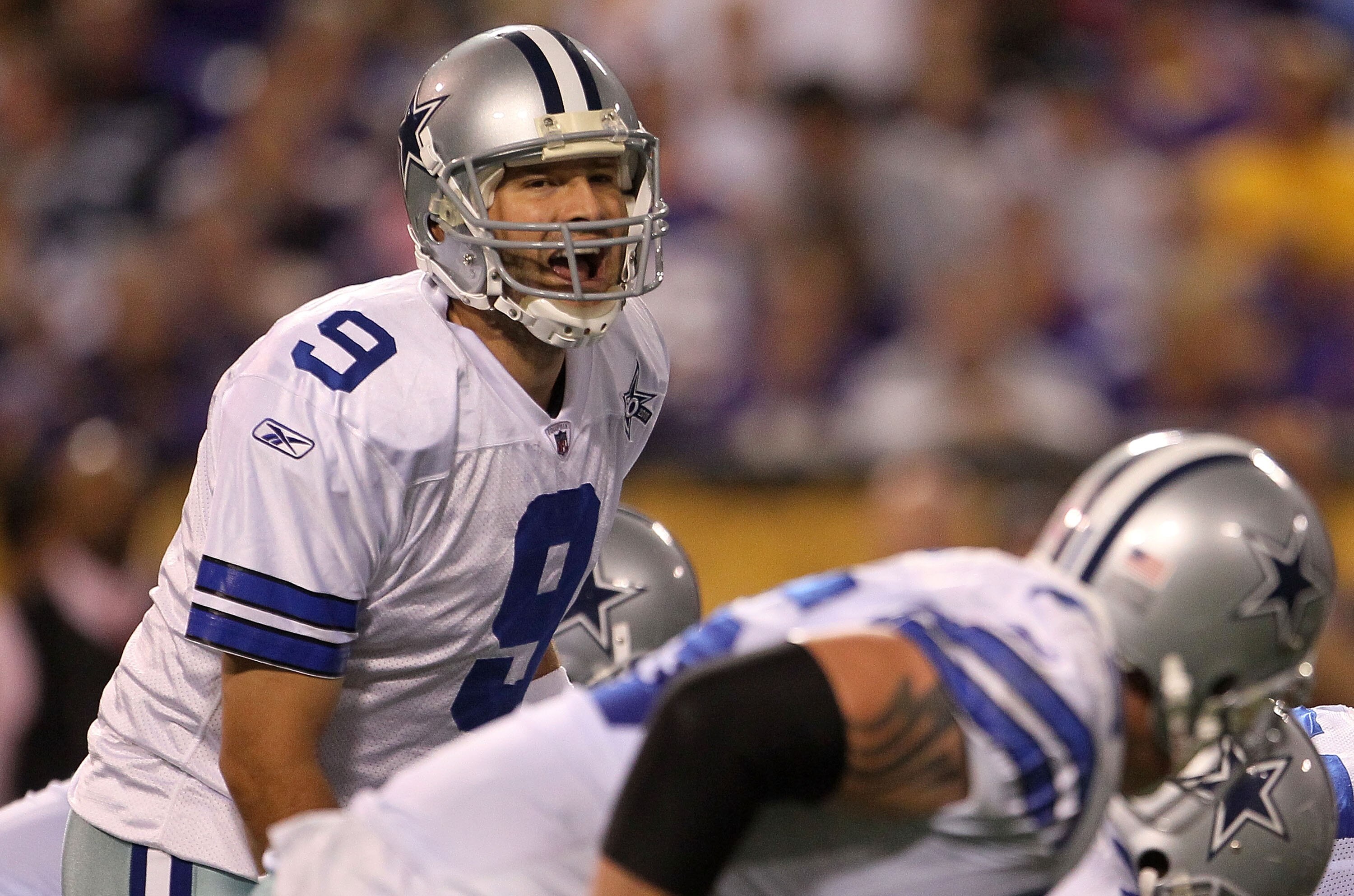 MINNEAPOLIS - OCTOBER 17:  Quarterback Tony Romo #9 of the Dallas Cowboys calls a play against the Minnesota Vikings at Mall of America Field on October 17, 2010 in Minneapolis, Minnesota.  (Photo by Jeff Gross/Getty Images)