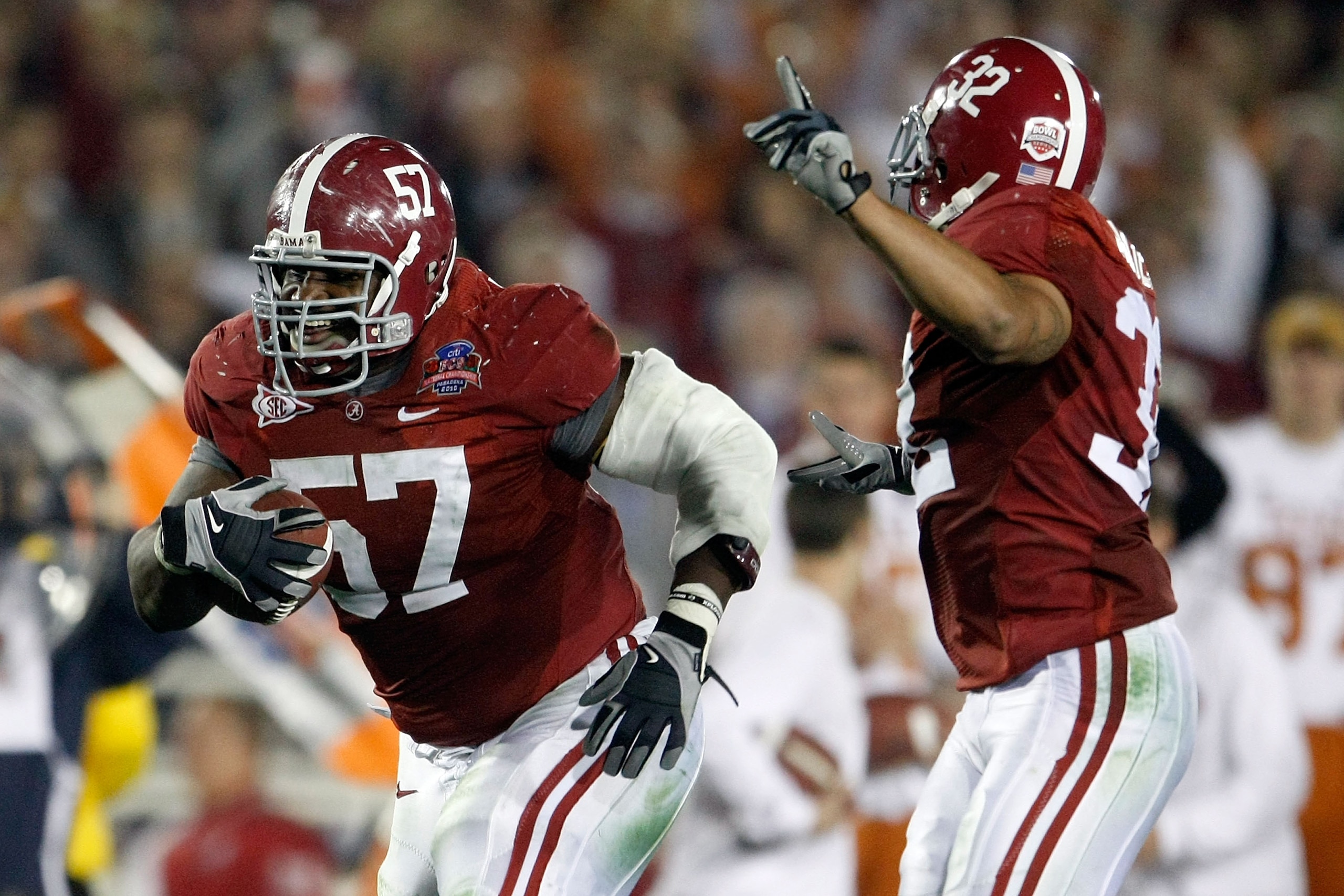 PASADENA, CA - JANUARY 07: Lineman Marcell Dareus #57 of the Alabama Crimson Tide runs with the ball after an interception against the Texas Longhorns during the second quarter of the Citi BCS National Championship game at the Rose Bowl on January 7, 201 PASADENA, CA - JANUARY 07: Lineman Marcell Dareus #57 of the Alabama Crimson Tide runs with the ball after an interception against the Texas Longhorns during the second quarter of the Citi BCS National Championship game at the Rose Bowl on January 7, 201