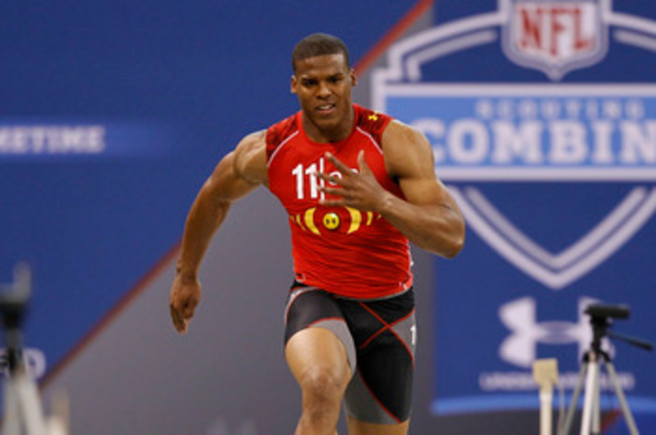 INDIANAPOLIS, IN - FEBRUARY 27: Cam Newton runs the 40-yard dash during the 2011 NFL Scouting Combine at Lucas Oil Stadium on February 27, 2011 in Indianapolis, Indiana. (Photo by Joe Robbins/Getty Images)