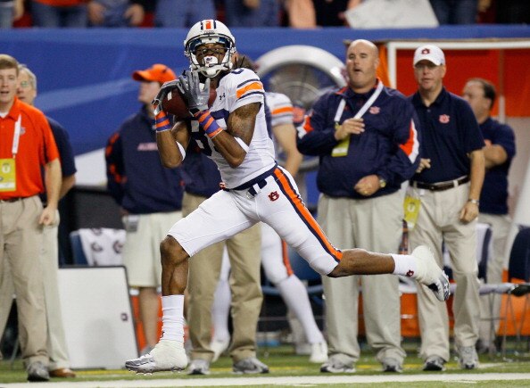 ATLANTA, GA - DECEMBER 04:  Darvin Adams #89 of the Auburn Tigers pulls in this touchdown reception against the South Carolina Gamecocks during the 2010 SEC Championship at Georgia Dome on December 4, 2010 in Atlanta, Georgia.  (Photo by Kevin C. Cox/Gett