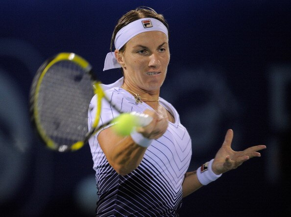 DUBAI, UNITED ARAB EMIRATES - FEBRUARY 18:  Svetlana Kuznetsova of Russia plays a shot during her quarter-final match against Agnieszka Radwanska of Poland during day five of the Dubai Duty Free Tennis Championships at the Dubai Tennis Stadium on February