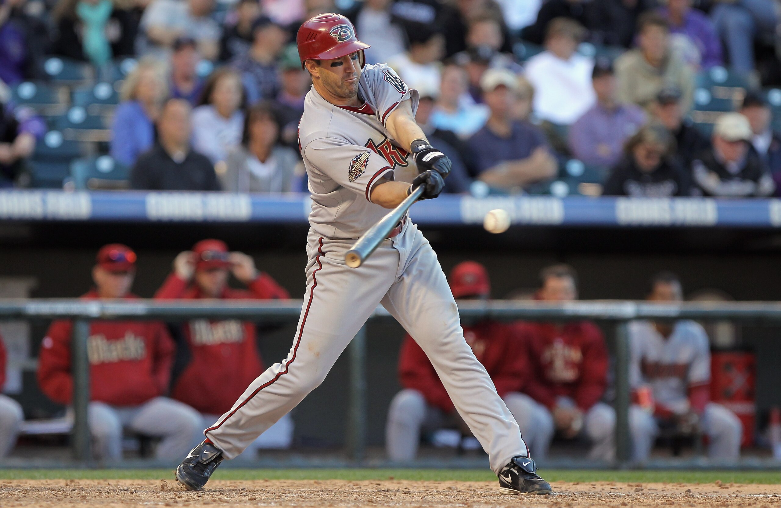 DENVER, CO - APRIL 01:  Willie Bloomquist #18 of the Arizona Diamondbacks takes an at bat against the Colorado Rockies during Opening Day at Coors Field on April 1, 2011 in Denver, Colorado. The Diamondbacks defeated the Rockies 7-6 in 11 innings.  (Photo