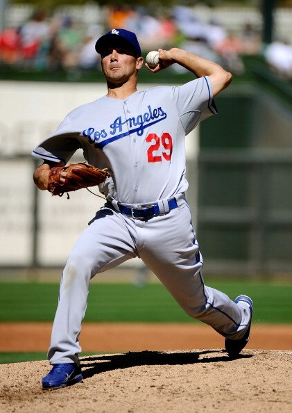 SURPRISE, AZ - MARCH 12:  Pitcher Ted Lilly #29 of the the Los Angeles Dodgers  throws a pitch during the spring training baseball game against the Kansas City Royals at Surprise Stadium on March 12, 2011 in Surprise, Arizona.  (Photo by Kevork Djansezian