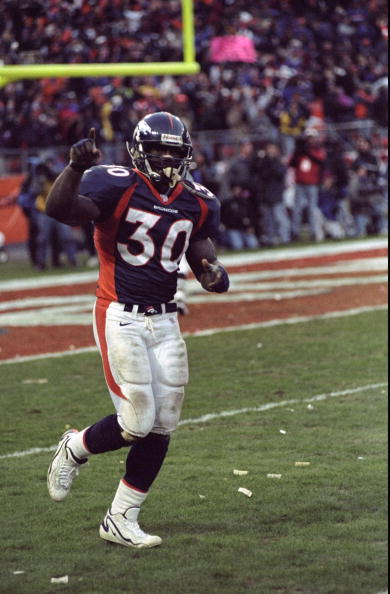 17 Jan 1999:  Terrell Davis #30 of the Denver Broncos celebrates during the AFC Championship Game against the New York Jets at Mile High Stadium in Denver, Colorado. The Broncos defeated the Jets 23-10. Mandatory Credit: Vincent Laforet  /Allsport