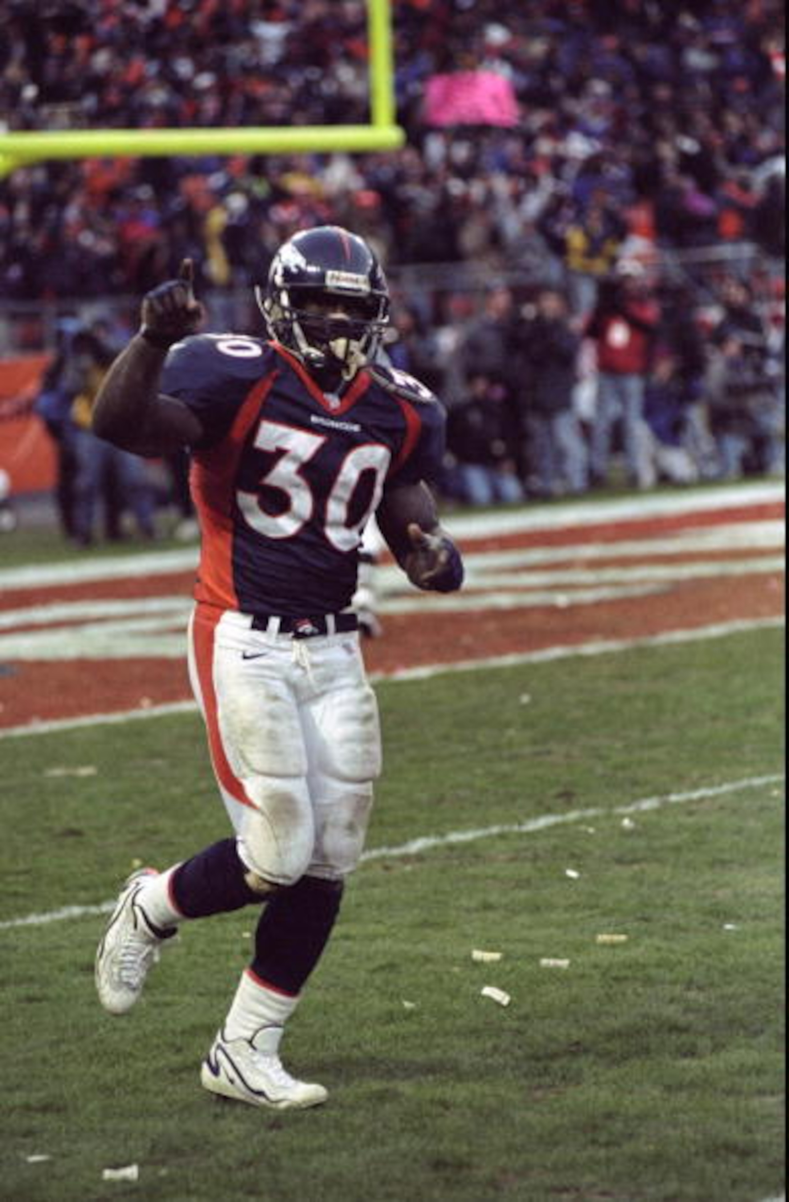 17 Jan 1999:  Terrell Davis #30 of the Denver Broncos celebrates during the AFC Championship Game against the New York Jets at Mile High Stadium in Denver, Colorado. The Broncos defeated the Jets 23-10. Mandatory Credit: Vincent Laforet  /Allsport