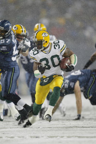 SEATTLE - NOVEMBER 27:  Running back Ahman Green #30 of the Green Bay Packers runs with the ball against the Seattle Seahawks on November 27, 2006 at Qwest Field in Seattle, Washington. The Seahawks defeated the Packers 34-24. (Photo by Otto Greule Jr/Get