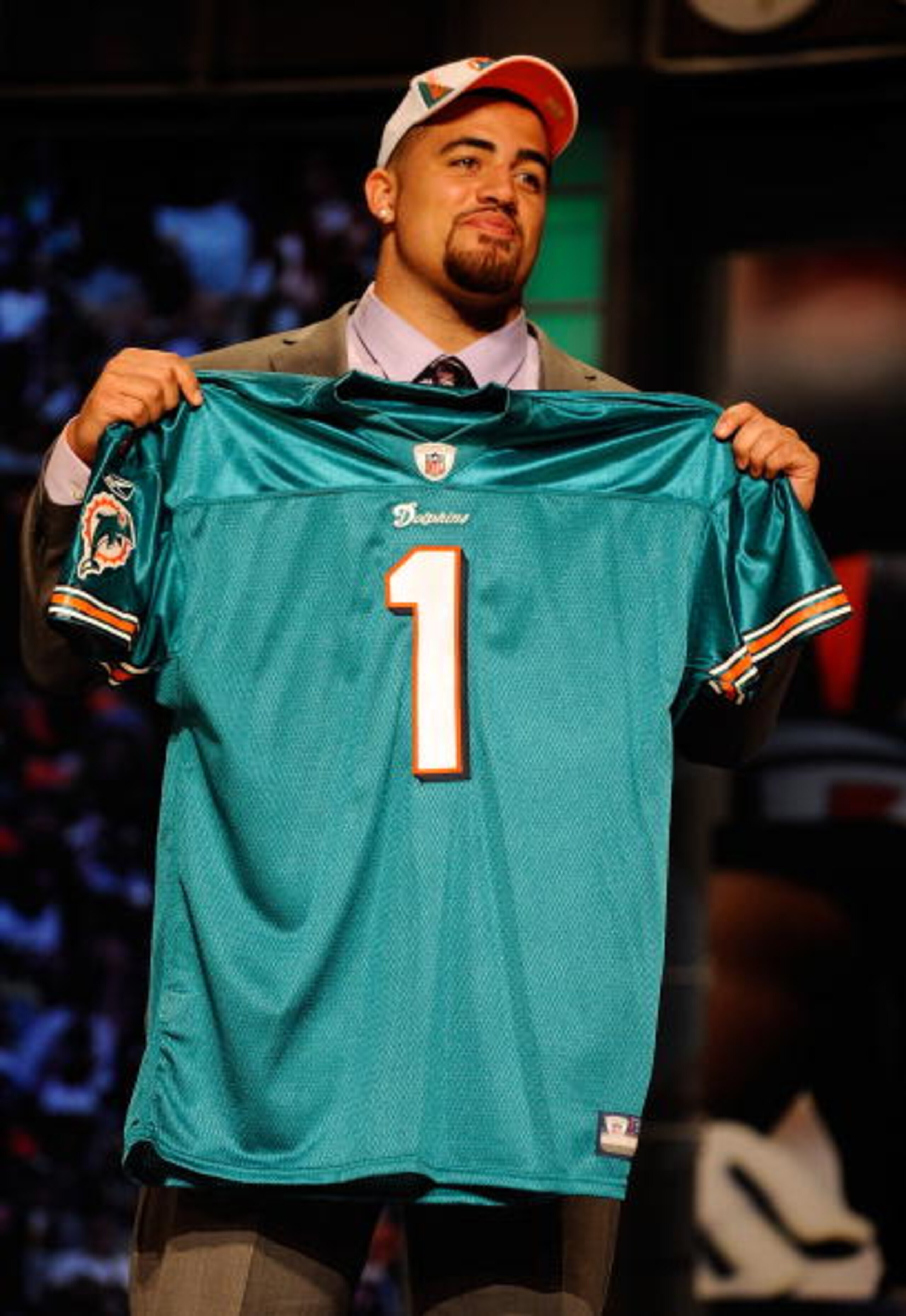 NEW YORK - APRIL 22:  Jared Odrick from Penn State holds up a Miami Dolphins jersey after the Dolphins selected Odrick number 28 overall during the first round of the 2010 NFL Draft at Radio City Music Hall on April 22, 2010 in New York City.  (Photo by J