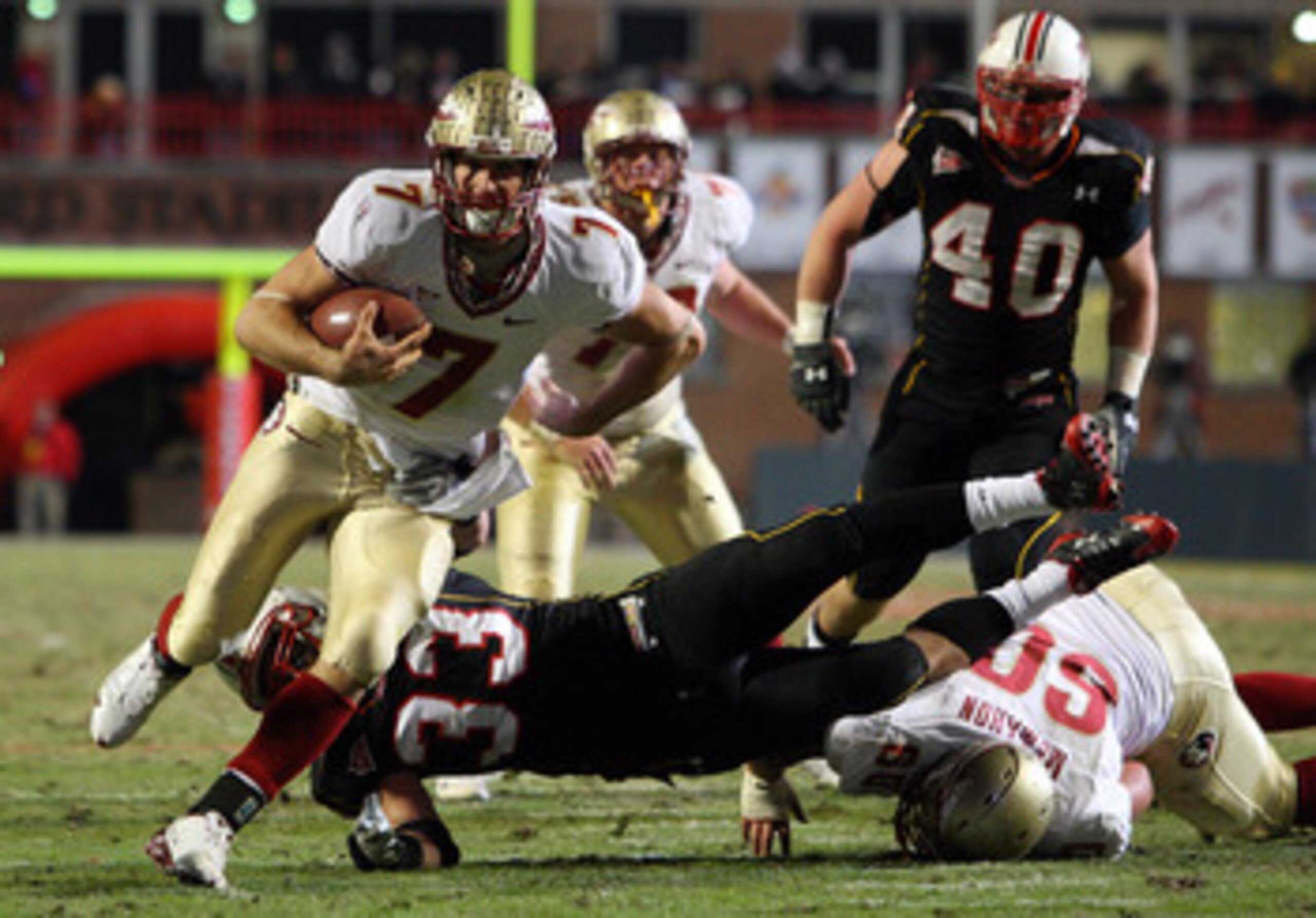 COLLEGE PARK, MD - NOVEMBER 22: Christian Ponder #7 of the Florida State Seminoles runs the ball past Alex Wujciak #33 of the Maryland Terrapins on November 22, 2008 at Byrd Stadium in College Park, Maryland. (Photo by Jim McIsaac/Getty Images) COLLEGE PARK, MD - NOVEMBER 22: Christian Ponder #7 of the Florida State Seminoles runs the ball past Alex Wujciak #33 of the Maryland Terrapins on November 22, 2008 at Byrd Stadium in College Park, Maryland. (Photo by Jim McIsaac/Getty Images)