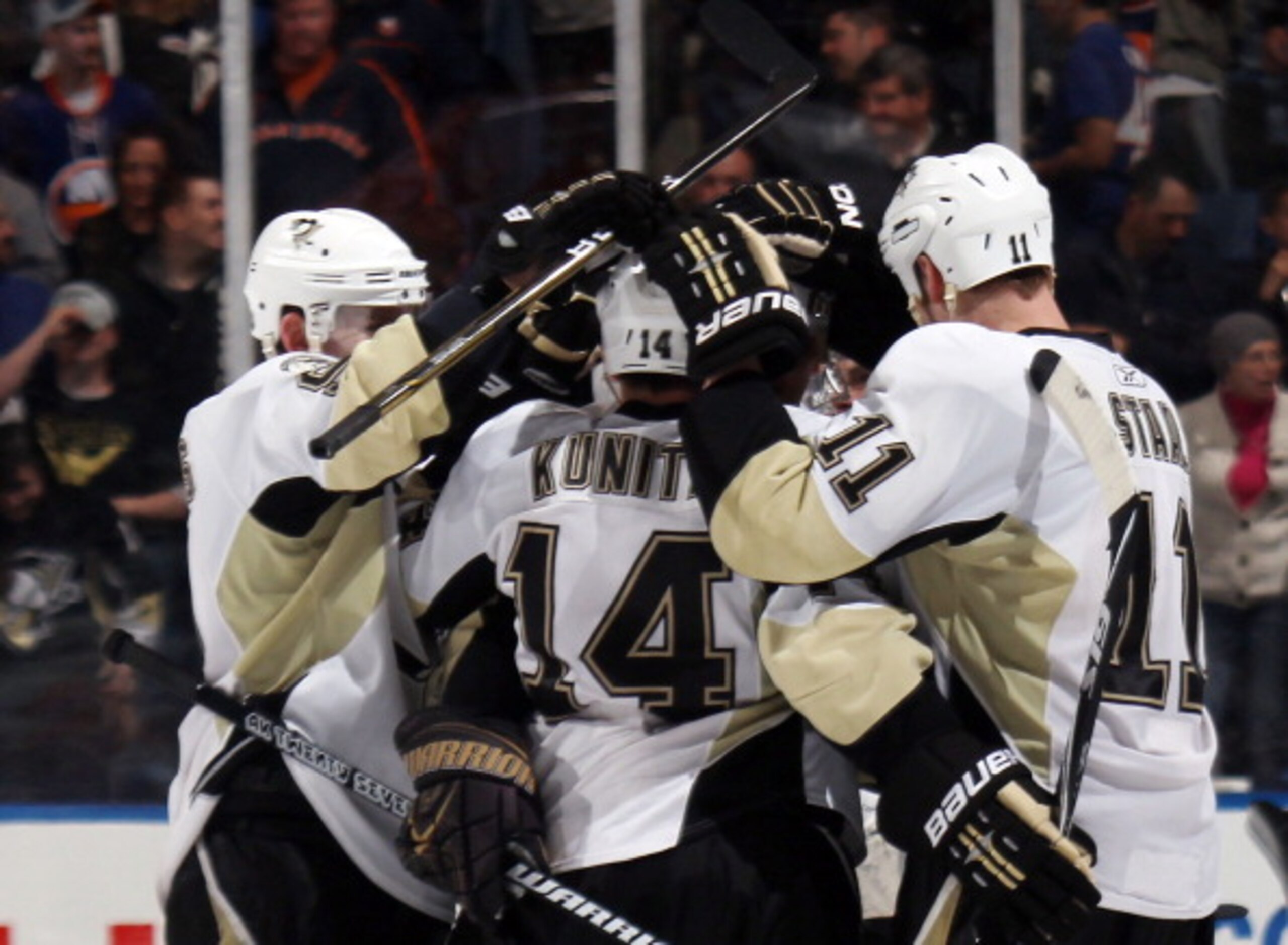 UNIONDALE, NY - APRIL 08: Chris Kunitz #14 and the Pittsburgh Penguins celebrate his shootout goal against the New York Islanders at the Nassau Coliseum on April 8, 2011 in Uniondale, New York. The Penguins defeated the Islanders 4-3 in the shoot out. (Ph