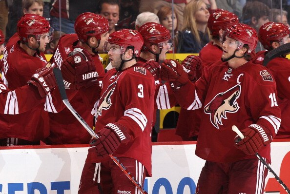 GLENDALE, AZ - APRIL 01:  Keith Yandle #3 of the Phoenix Coyotes celebrates with teammates during the NHL game against the Colorado Avalanche at Jobing.com Arena on April 1, 2011 in Glendale, Arizona. The Avalanche defeated the Coyotes 4-3 in an overtime