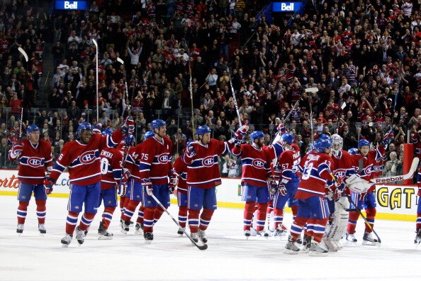 MONTREAL, CANADA - APRIL 5:  Members of the Montreal Canadiens wave to fans after defeating the Chicago Blackhawks and clinching a playoff position during the NHL game at the Bell Centre on April 5, 2011 in Montreal, Quebec, Canada.  The Canadiens defeate