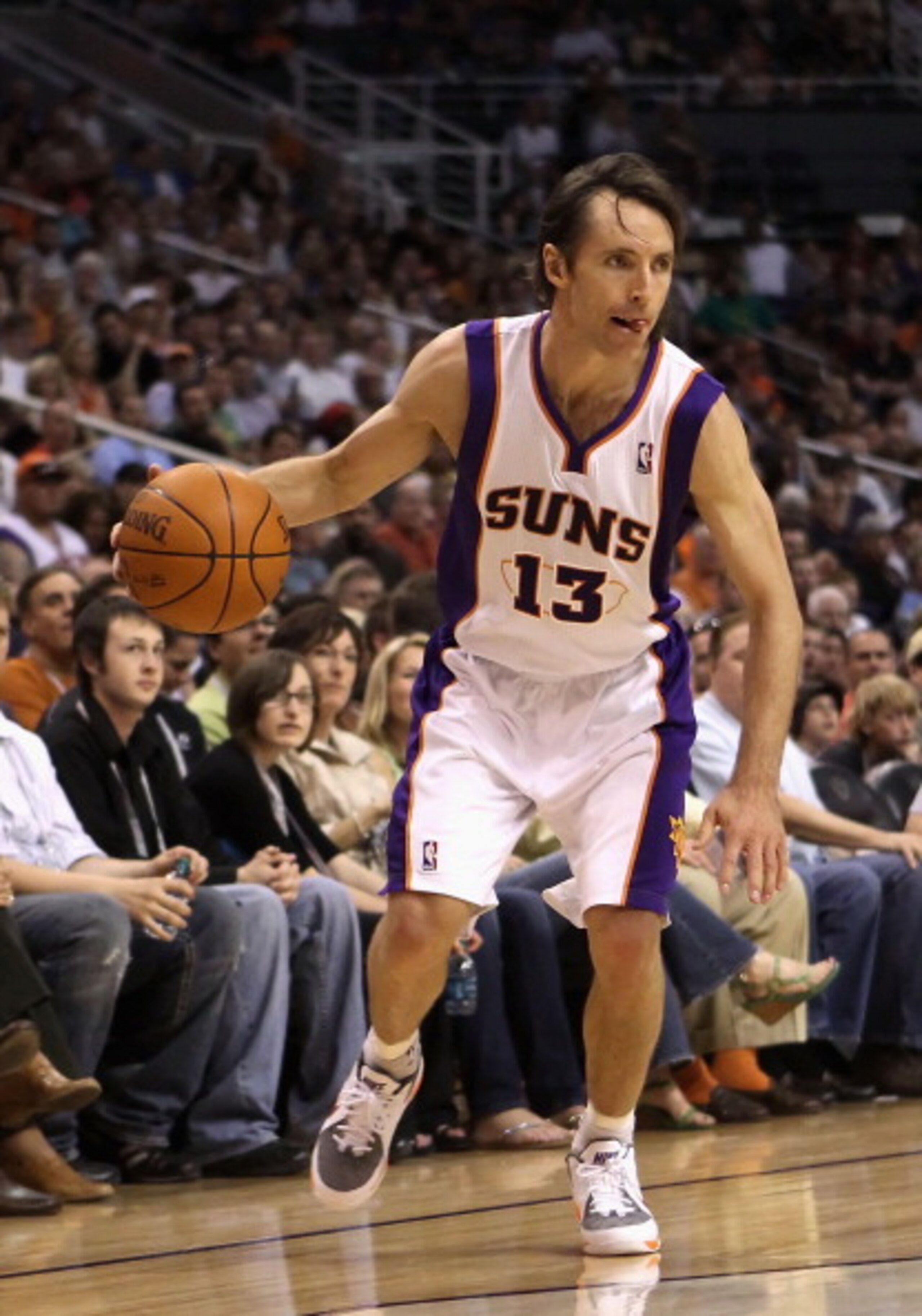PHOENIX, AZ - MARCH 30: Steve Nash #13 of the Phoenix Suns handles the ball during the NBA game against the Oklahoma City Thunder at US Airways Center on March 30, 2011 in Phoenix, Arizona. The Thunder defeated the Suns 116-98. NOTE TO USER: User expres PHOENIX, AZ - MARCH 30: Steve Nash #13 of the Phoenix Suns handles the ball during the NBA game against the Oklahoma City Thunder at US Airways Center on March 30, 2011 in Phoenix, Arizona. The Thunder defeated the Suns 116-98. NOTE TO USER: User expres