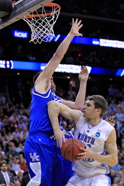 NEWARK, NJ - MARCH 27:  Tyler Zeller #44 of the North Carolina Tar Heels in action against Josh Harrellson #55 of the Kentucky Wildcats during the east regional final of the 2011 NCAA men's basketball tournament at Prudential Center on March 27, 2011 in N