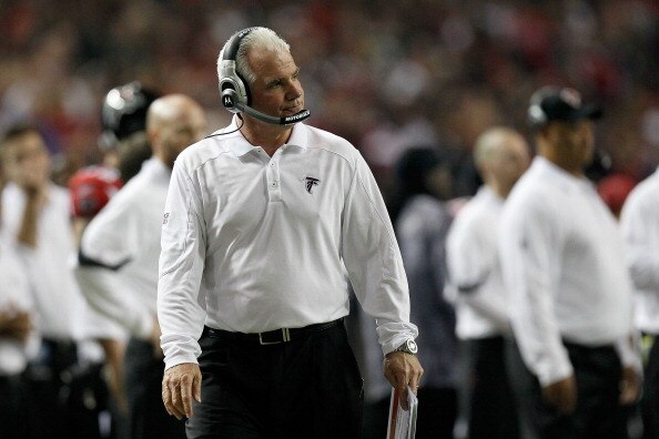 ATLANTA, GA - JANUARY 15:  Head coach Mike Smith of the Atlanta Falcons looks on as he coaches against the Green Bay Packers during their 2011 NFC divisional playoff game at Georgia Dome on January 15, 2011 in Atlanta, Georgia. The Packers won 48-21. (Pho