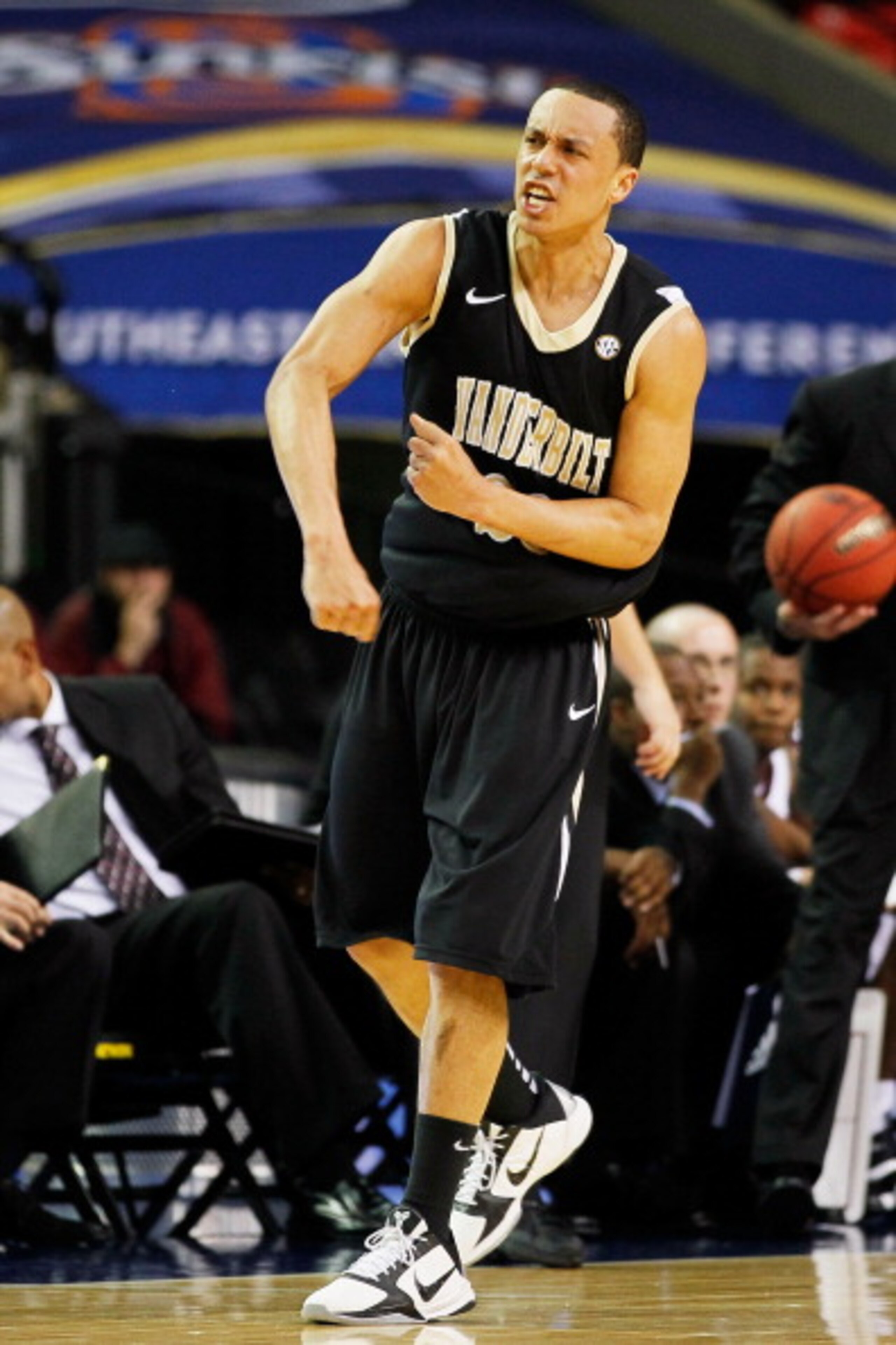 ATLANTA, GA - MARCH 11: John Jenkins #23 of the Vanderbilt Commodores celebrates their win over the Mississippi State Bulldogs during the quarterfinals of the SEC Men's Basketball Tournament at Georgia Dome on March 11, 2011 in Atlanta, Georgia. The Comm ATLANTA, GA - MARCH 11: John Jenkins #23 of the Vanderbilt Commodores celebrates their win over the Mississippi State Bulldogs during the quarterfinals of the SEC Men's Basketball Tournament at Georgia Dome on March 11, 2011 in Atlanta, Georgia. The Comm