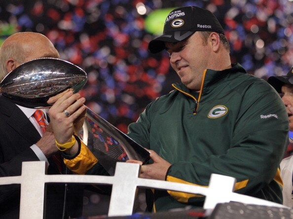 ARLINGTON, TX - FEBRUARY 06:  Head coach Mike McCarthy of the Green Bay Packers holds up The Vince Lombardi Trophy after the Green Bay Packers defeated the Pittsburgh Steelers 31 to 25 in Super Bowl XLV at Cowboys Stadium on February 6, 2011 in Arlington,