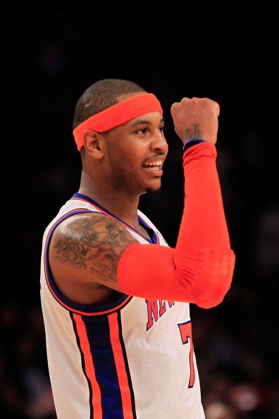 NEW YORK, NY - MARCH 30:  Carmelo Anthony #7 of the New York Knicks celebrates during the game against the New Jersey Nets at Madison Square Garden on March 30, 2011 in New York City. NOTE TO USER: User expressly acknowledges and agrees that, by downloadi