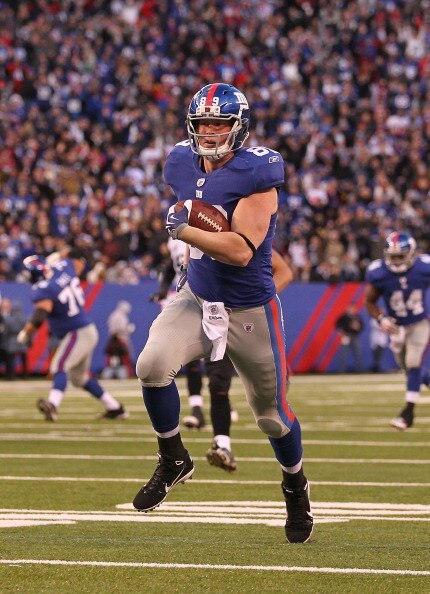 EAST RUTHERFORD, NJ - NOVEMBER 28:  Kevin Boss #89 of the New York Giants scores the game winning touchdown against the Jacksonville Jaguars putting the Giants ahead 24-20  during the fourth Quarter of their game on November 28, 2010 at The New Meadowland