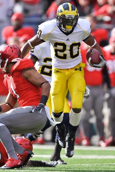 COLUMBUS, OH - NOVEMBER 27:  Michael Shaw #20 of the Michigan Wolverines runs with the ball against the Ohio State Buckeyes at Ohio Stadium on November 27, 2010 in Columbus, Ohio.  (Photo by Jamie Sabau/Getty Images)