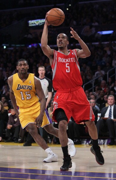 LOS ANGELES, CA - FEBRUARY 01:  Courtney Lee #5 of the Houston Rockets drives past Ron Artest #15 of the Los Angeles Lakers in the second half at Staples Center on February 1, 2011 in Los Angeles, California. The Lakers defeated the Rockets 114-106. NOTE