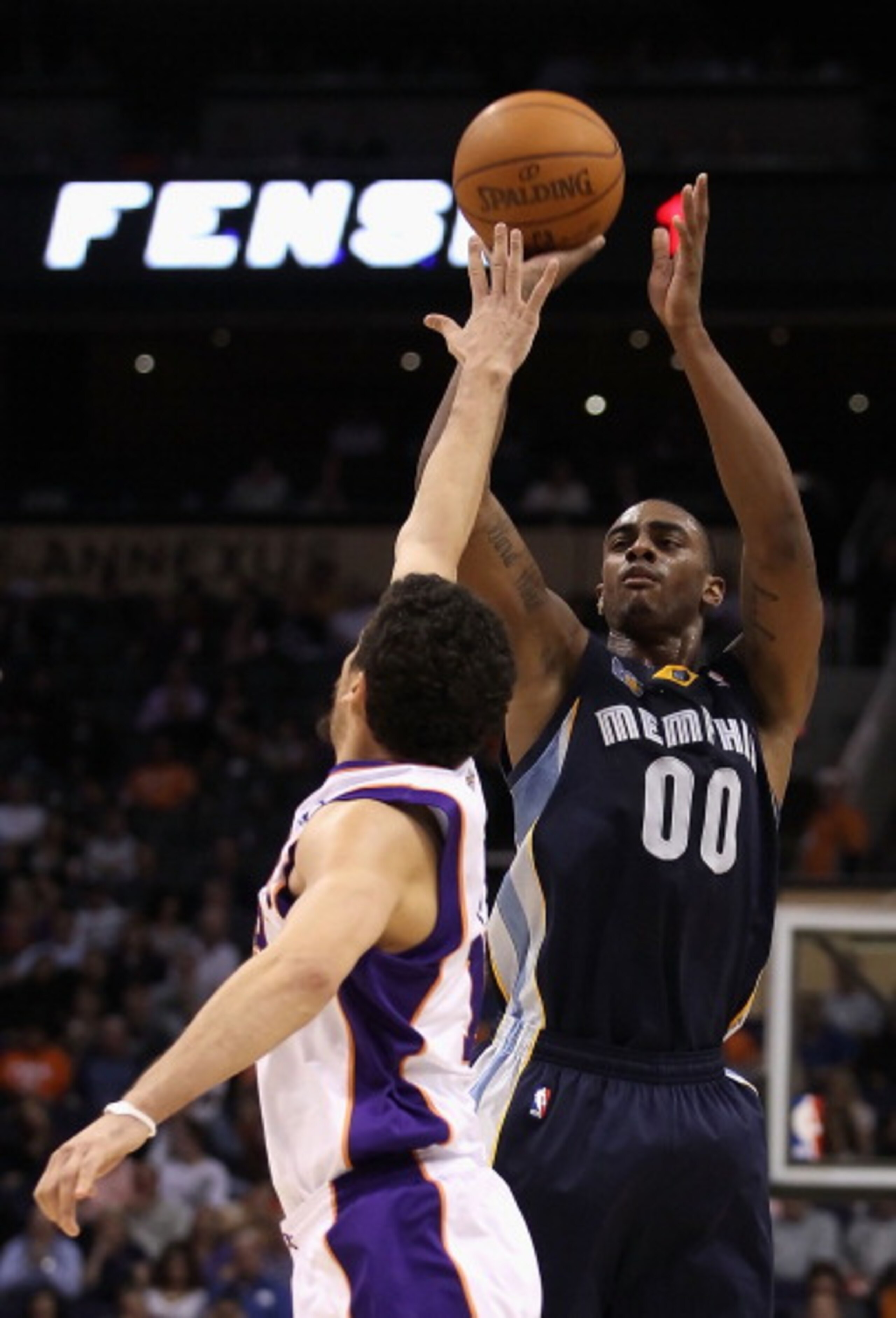 PHOENIX - DECEMBER 08: Darrell Arthur #00 of the Memphis Grizzlies puts up a shot against the Phoenix Suns during the NBA game at US Airways Center on December 8, 2010 in Phoenix, Arizona. NOTE TO USER: User expressly acknowledges and agrees that, by dow PHOENIX - DECEMBER 08: Darrell Arthur #00 of the Memphis Grizzlies puts up a shot against the Phoenix Suns during the NBA game at US Airways Center on December 8, 2010 in Phoenix, Arizona. NOTE TO USER: User expressly acknowledges and agrees that, by dow