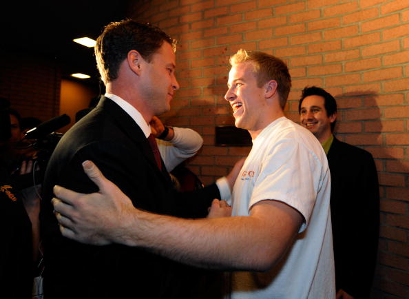 LOS ANGELES, CA - JANUARY 13:  Lane Kiffin (L) new college football coach of University of Southern California greets quarterback Matt Barkley after arriving for a news conference at Heritage Hall on the campus of USC on January 13, 2010 in Los Angeles, C