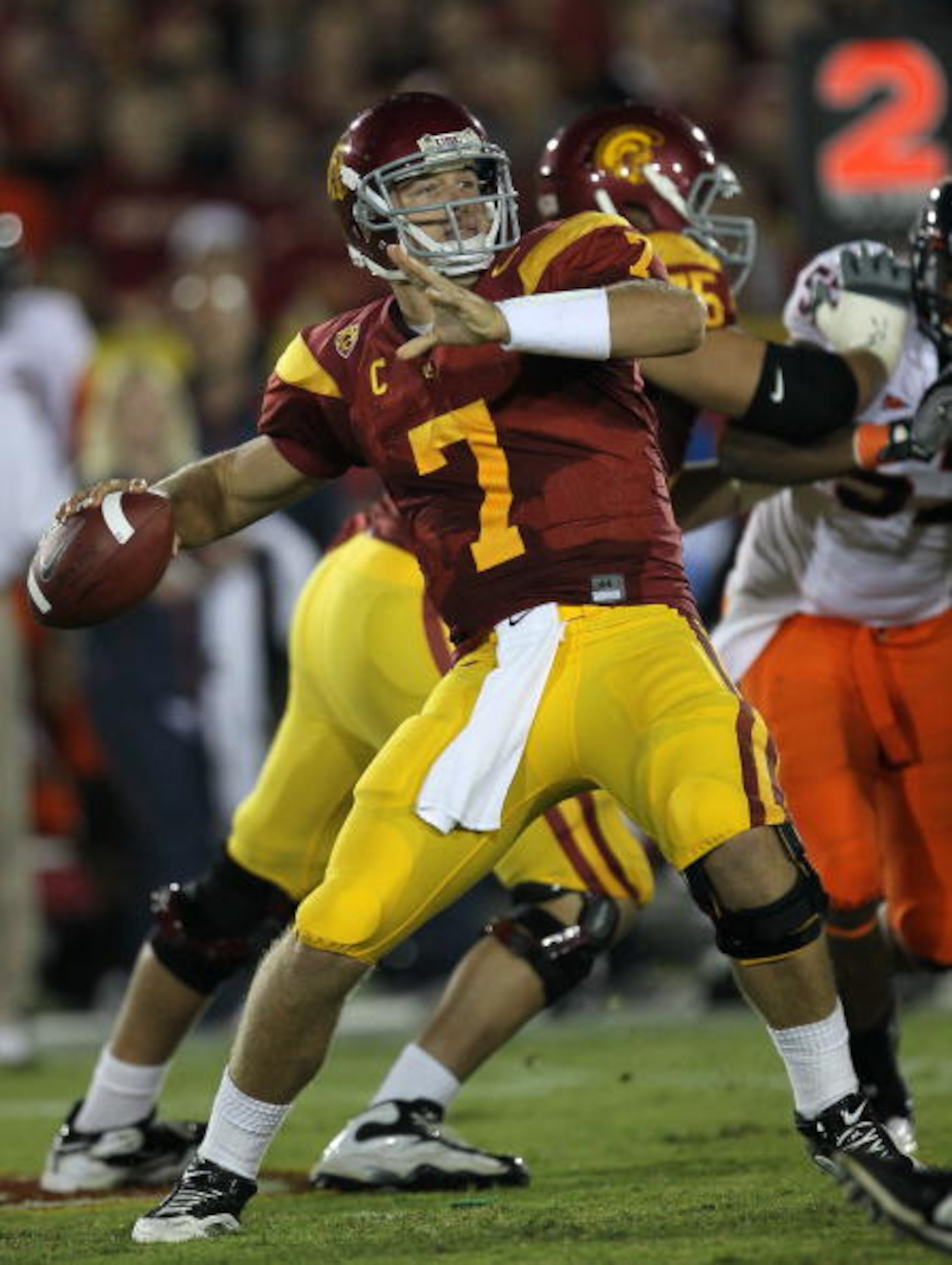 LOS ANGELES, CA - SEPTEMBER 11:  Quarterback Matt Barkley #7 of the USC Trojans throws a pass against the Virginia Cavaliers at Los Angeles Memorial Coliseum on September 11, 2010 in Los Angeles, California. USC won 17-14.  (Photo by Stephen Dunn/Getty Im