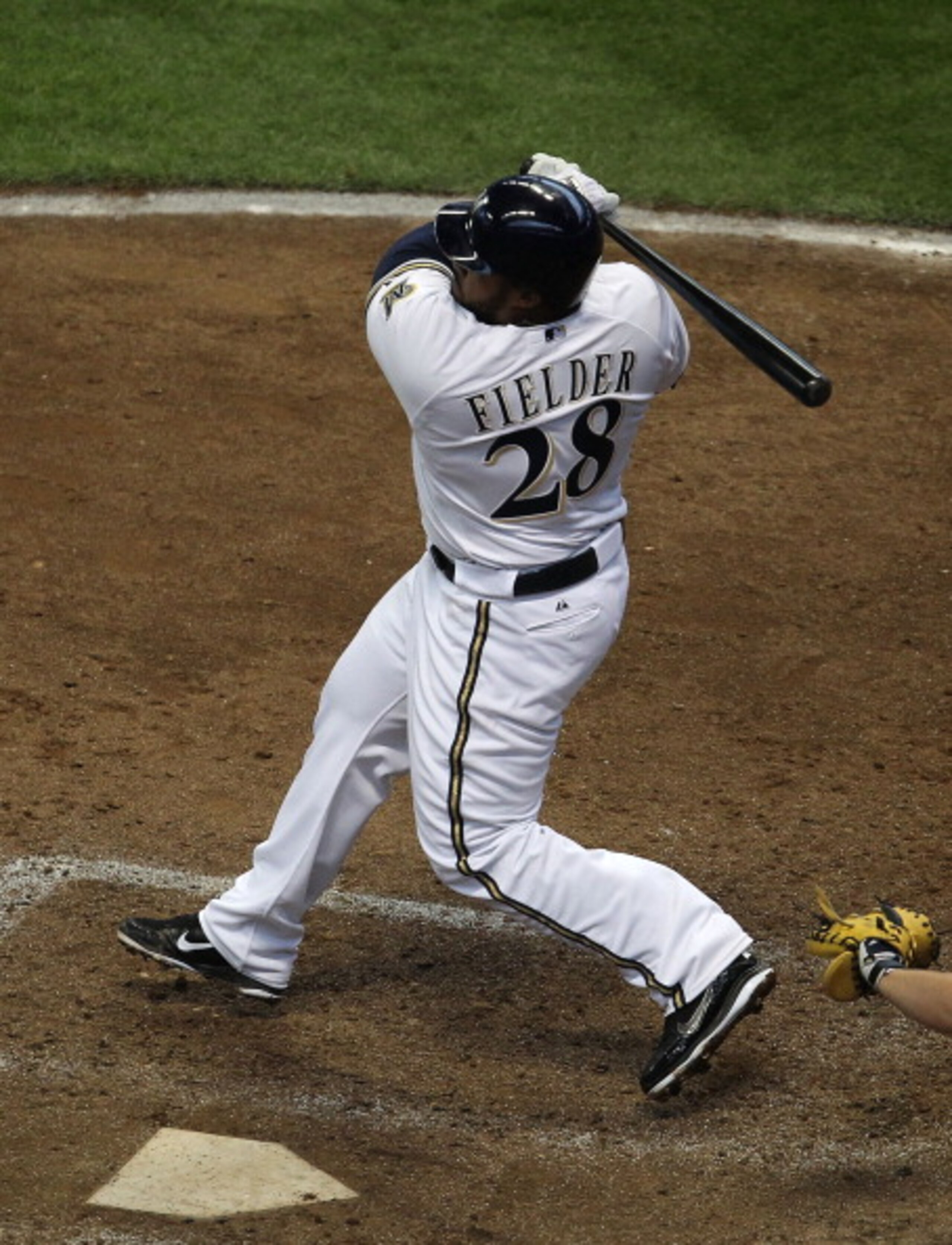 MILWAUKEE, WI - APRIL 04: Prince Fielder #28 of the Milwaukee Brewers hits the ball against the Atlanta Braves during the home opener at Miller Park on April 4, 2011 in Milwaukee, Wisconsin. The Braves defeated the Brewers 2-1. (Photo by Jonathan Daniel/G MILWAUKEE, WI - APRIL 04: Prince Fielder #28 of the Milwaukee Brewers hits the ball against the Atlanta Braves during the home opener at Miller Park on April 4, 2011 in Milwaukee, Wisconsin. The Braves defeated the Brewers 2-1. (Photo by Jonathan Daniel/G