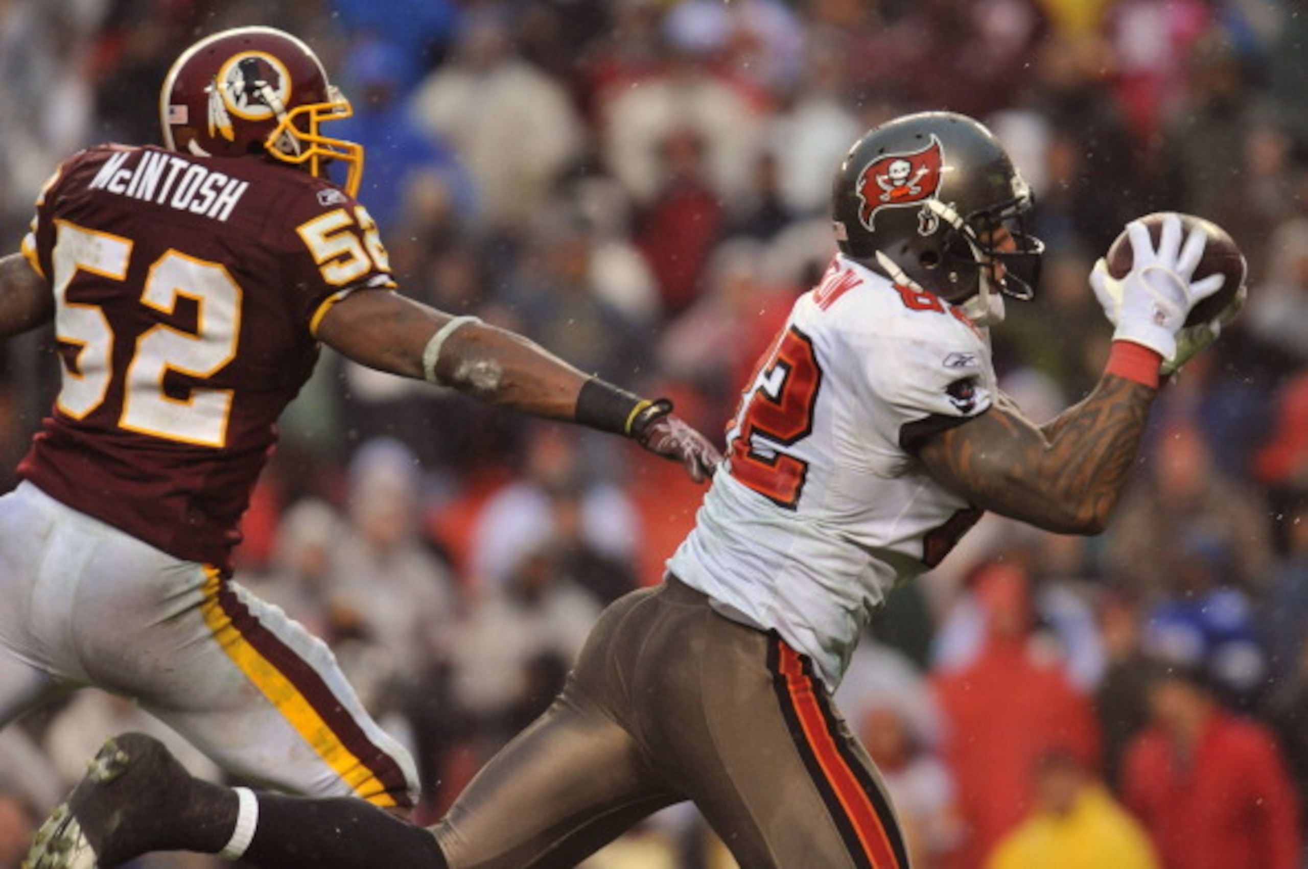 LANDOVER, MD - DECEMBER 12:  Kellen Winslow #82 of the Tampa Bay Buccaneers makes a catch for a fourth quarter touchdown against the Washington Redskins  at FedExField on December 12, 2010 in Landover, Maryland. The Buccaneers defeated the Redskins 17-16.
