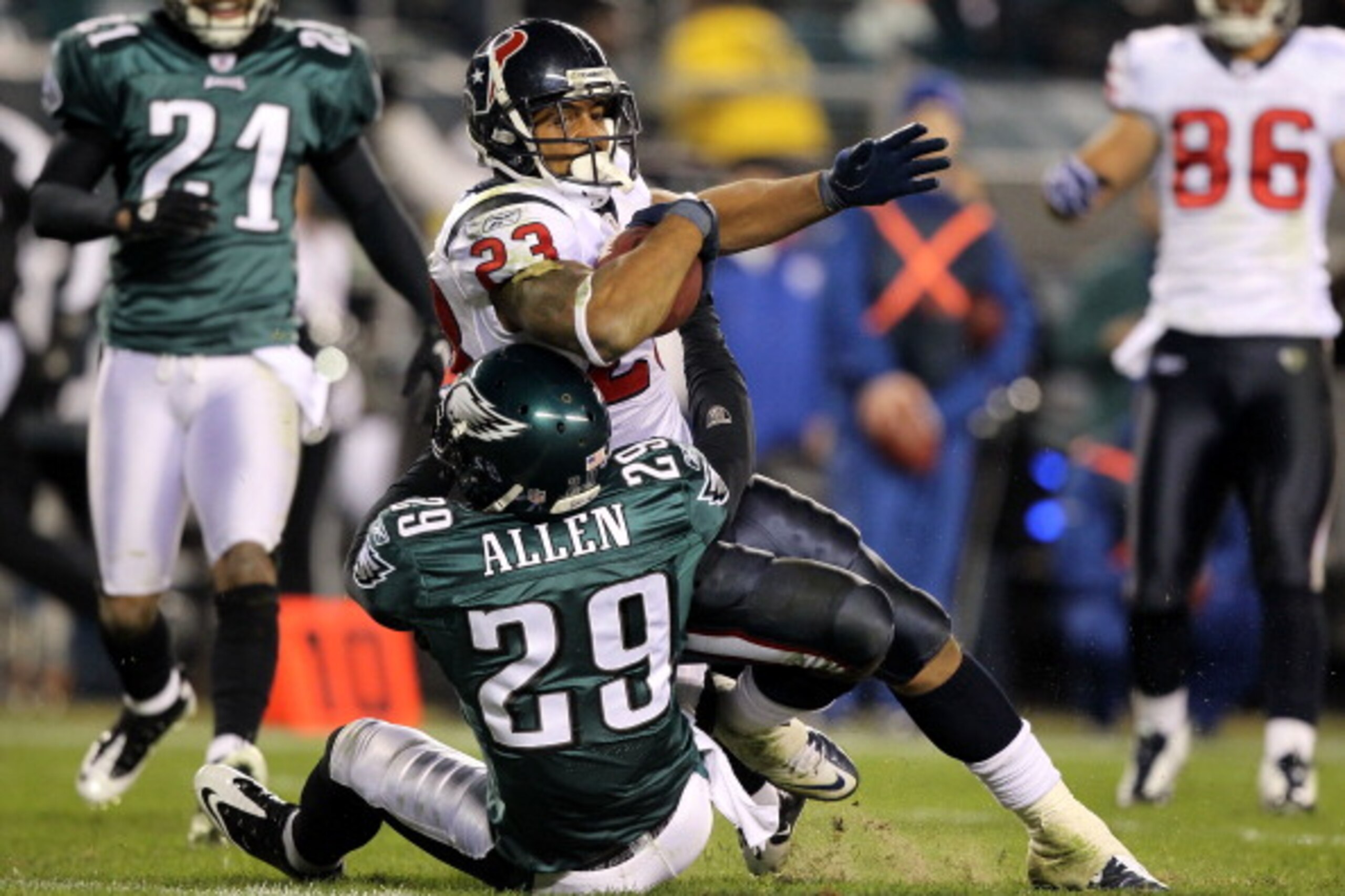 PHILADELPHIA, PA - DECEMBER 02:  Arian Foster #23 of the Houston Texans scores on a 14-yard touchdown reception in the third quarter against Nate Allen #29 of the Philadelphia Eagles at Lincoln Financial Field on December 2, 2010 in Philadelphia, Pennsylv