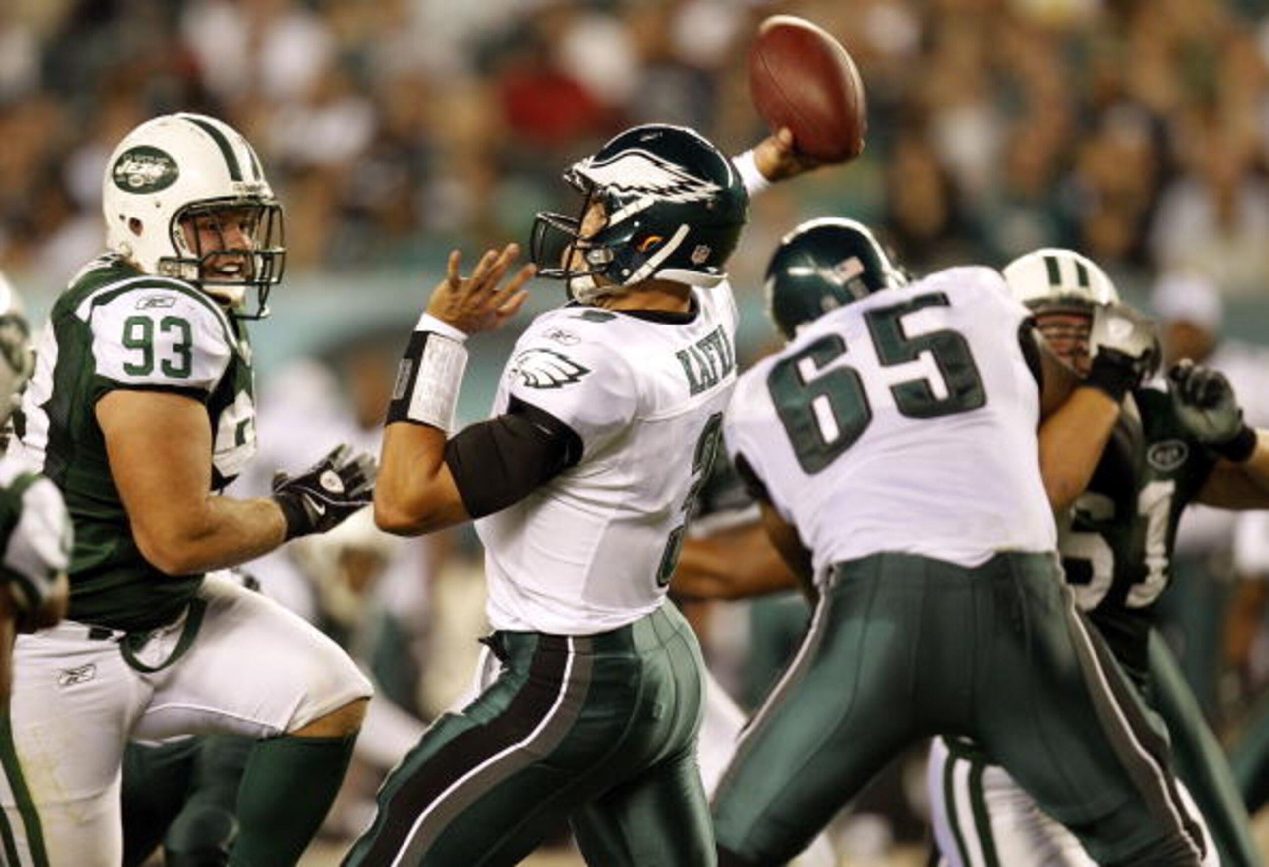 PHILADELPHIA - SEPTEMBER 02:  Mike Kafka #3 of the Philadelphia Eagles passes under pressure from Matt Kroul #93 of the New York Jets during a preseason game at Lincoln Financial Field on September 2, 2010 in Philadelphia, Pennsylvania.  (Photo by Jeff Ze