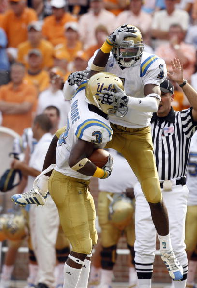 KNOXVILLE, TN - SEPTEMBER 12: Alterrau Verner #1 and Rahim Moore #3 of the UCLA Bruins celebrate against the Tennessee Volunteers on September 12, 2009 at Neyland Stadium in Knoxville, Tennessee. UCLA beat Tennessee 19-15. (Photo by Joe Murphy/Getty Image