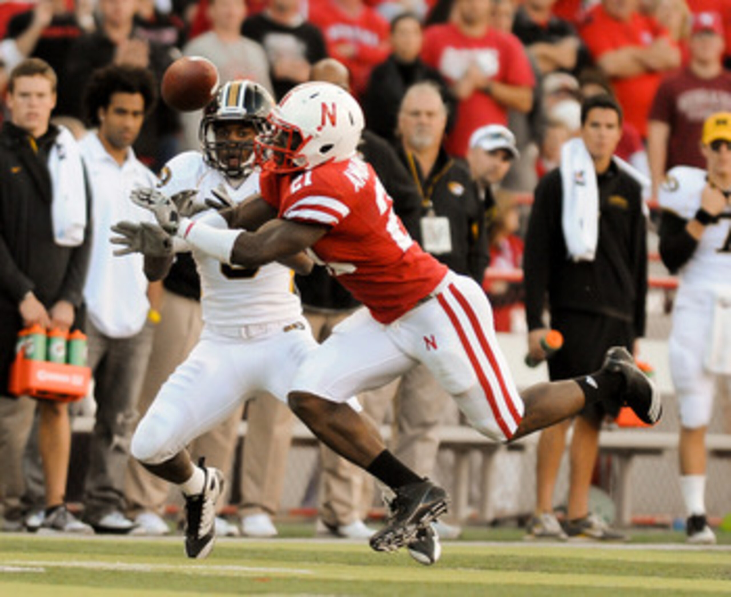 LINCOLN, NE - OCTOBER 30: Cornerback Prince Amukamara #21 of the Nebraska Cornhuskers breaks up a pass intended wide receiver Wes Kemp #8 of the during second half action of their game at Memorial Stadium on October 30, 2010 in Lincoln, Nebraska. Nebraska LINCOLN, NE - OCTOBER 30: Cornerback Prince Amukamara #21 of the Nebraska Cornhuskers breaks up a pass intended wide receiver Wes Kemp #8 of the during second half action of their game at Memorial Stadium on October 30, 2010 in Lincoln, Nebraska. Nebraska