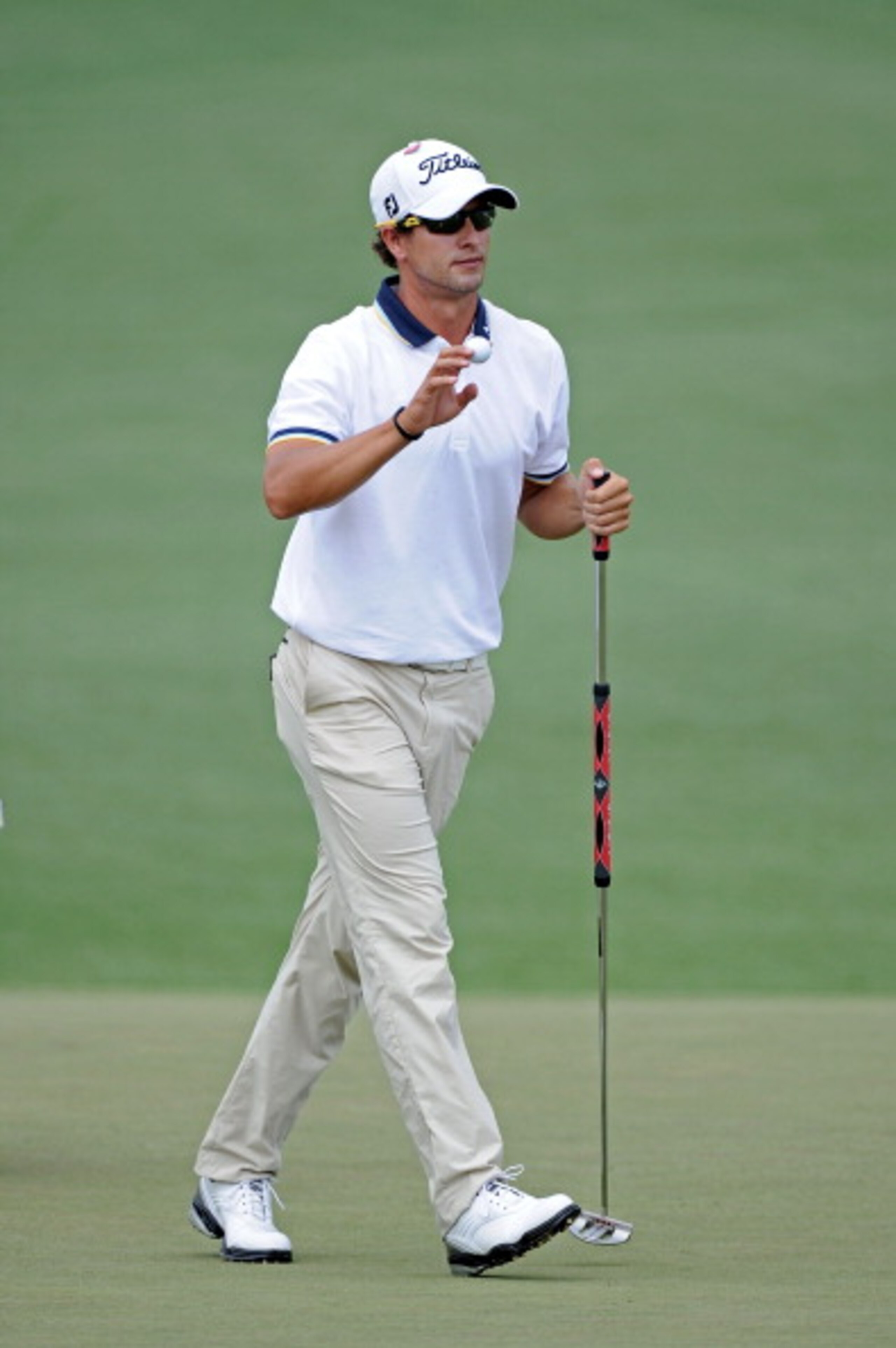 AUGUSTA, GA - APRIL 09:  Adam Scott of Australia walks across the second green during the third round of the 2011 Masters Tournament at Augusta National Golf Club on April 9, 2011 in Augusta, Georgia.  (Photo by Harry How/Getty Images)