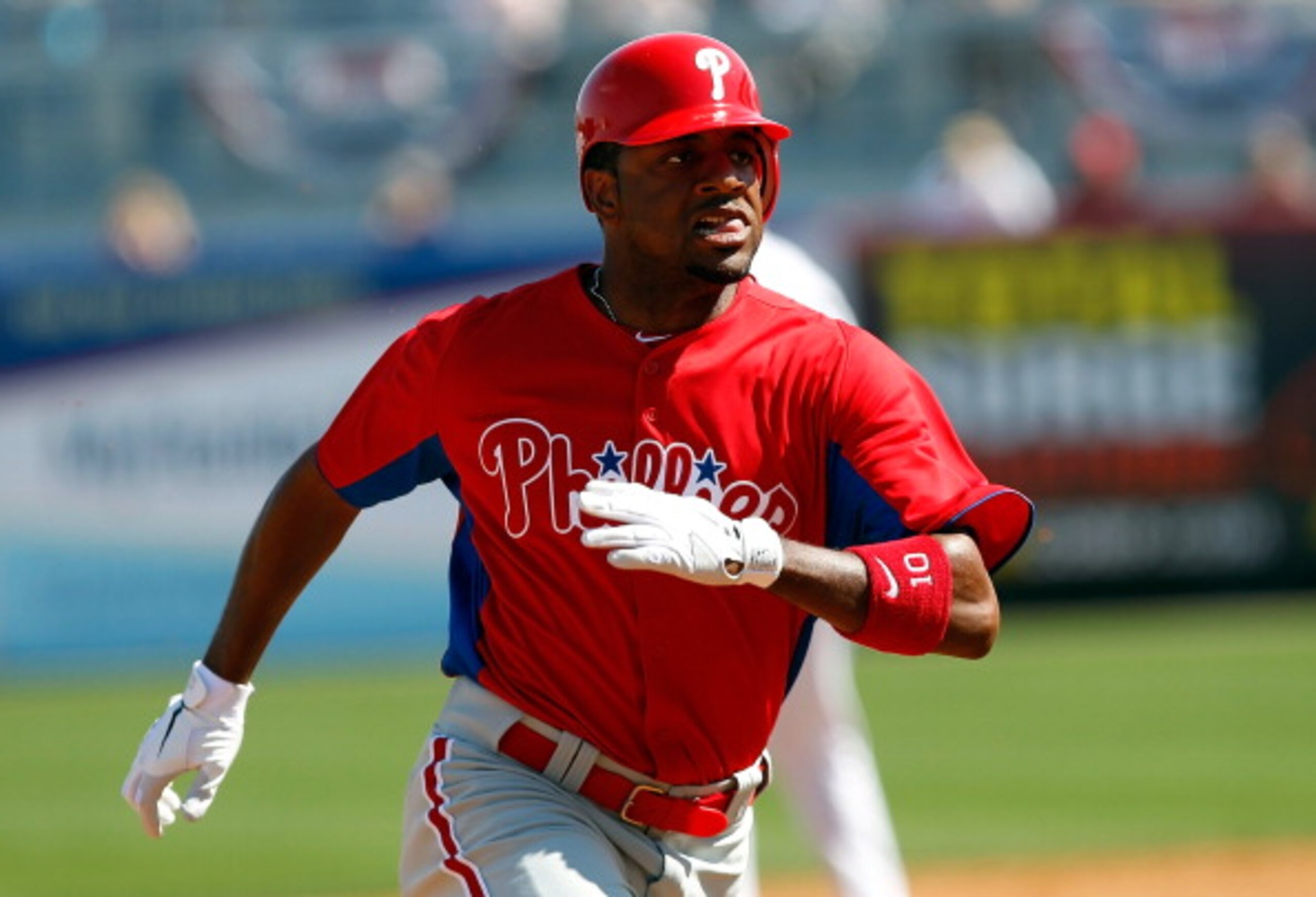 TAMPA, FL - FEBRUARY 26:  Outfielder Ben Francisco #10 of the Philadelphia Phillies advances to third against the New York Yankees during a Grapefruit League Spring Training Game at George M. Steinbrenner Field on February 26, 2011 in Tampa, Florida.  (Ph
