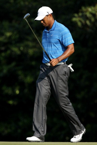 AUGUSTA, GA - APRIL 09:  Tiger Woods reacts to a missed putt on the 11th hole during the third round of the 2011 Masters Tournament at Augusta National Golf Club on April 9, 2011 in Augusta, Georgia.  (Photo by Andrew Redington/Getty Images)