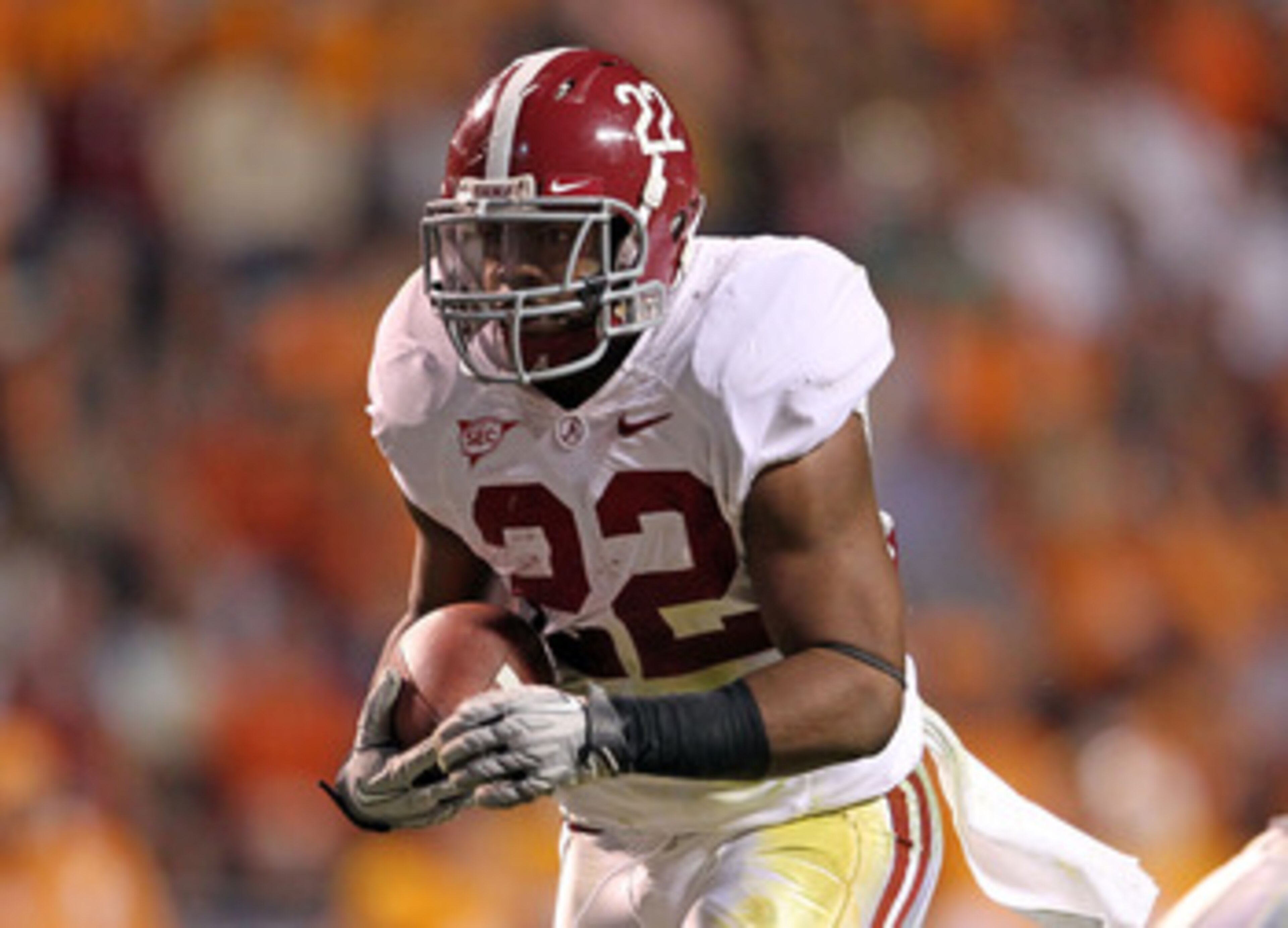 KNOXVILLE, TN - OCTOBER 23: Mark Ingram #22 of the Alabama Crimson Tide runs with the ball during the SEC game against the Tennessee Volunteers at Neyland Stadium on October 23, 2010 in Knoxville, Tennessee. (Photo by Andy Lyons/Getty Images) KNOXVILLE, TN - OCTOBER 23: Mark Ingram #22 of the Alabama Crimson Tide runs with the ball during the SEC game against the Tennessee Volunteers at Neyland Stadium on October 23, 2010 in Knoxville, Tennessee. (Photo by Andy Lyons/Getty Images)