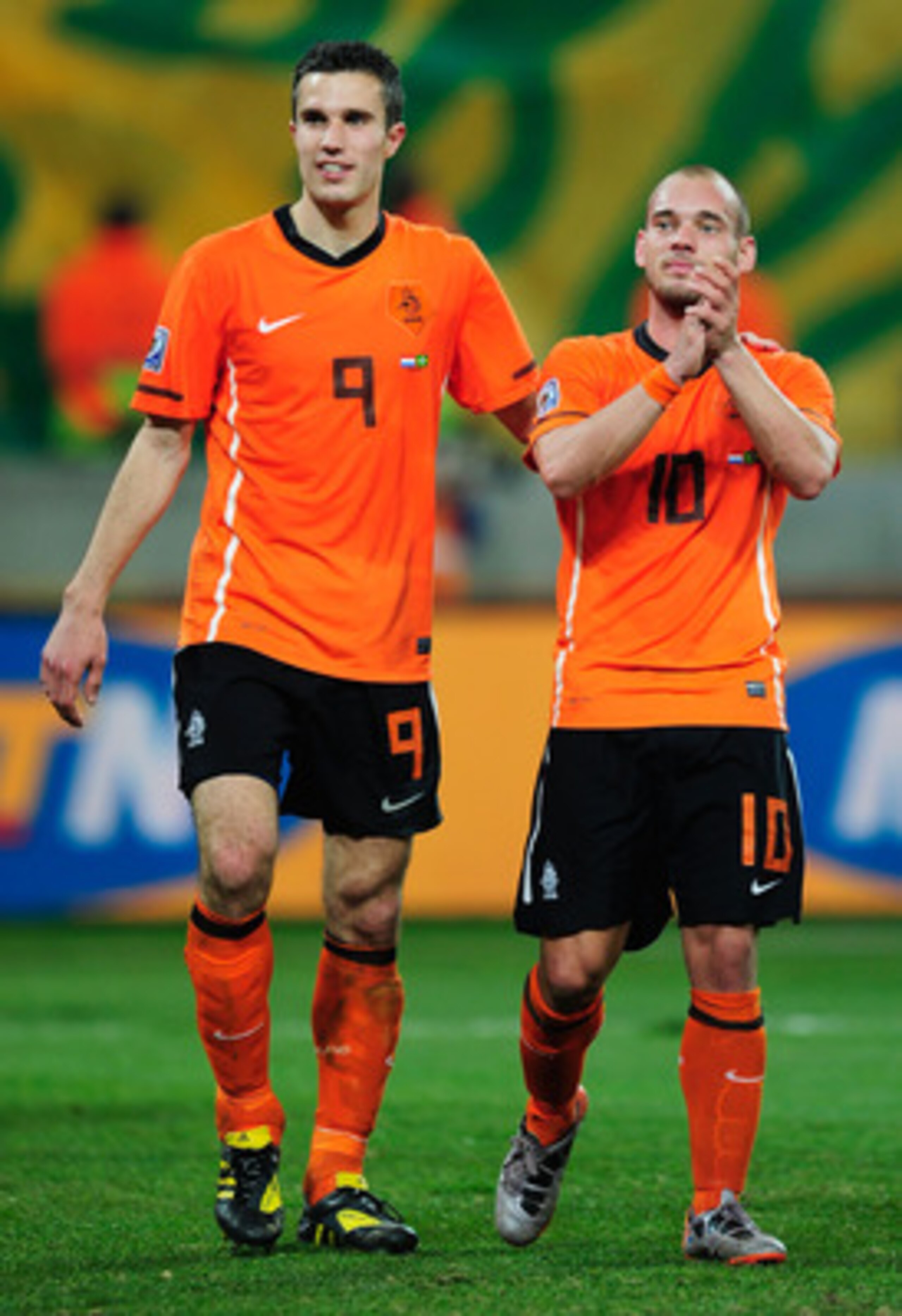 PORT ELIZABETH, SOUTH AFRICA - JULY 02:  Robin Van Persie and Wesley Sneijder of the Netherlands celebrate victory following the 2010 FIFA World Cup South Africa Quarter Final match between Netherlands and Brazil at Nelson Mandela Bay Stadium on July 2, 2