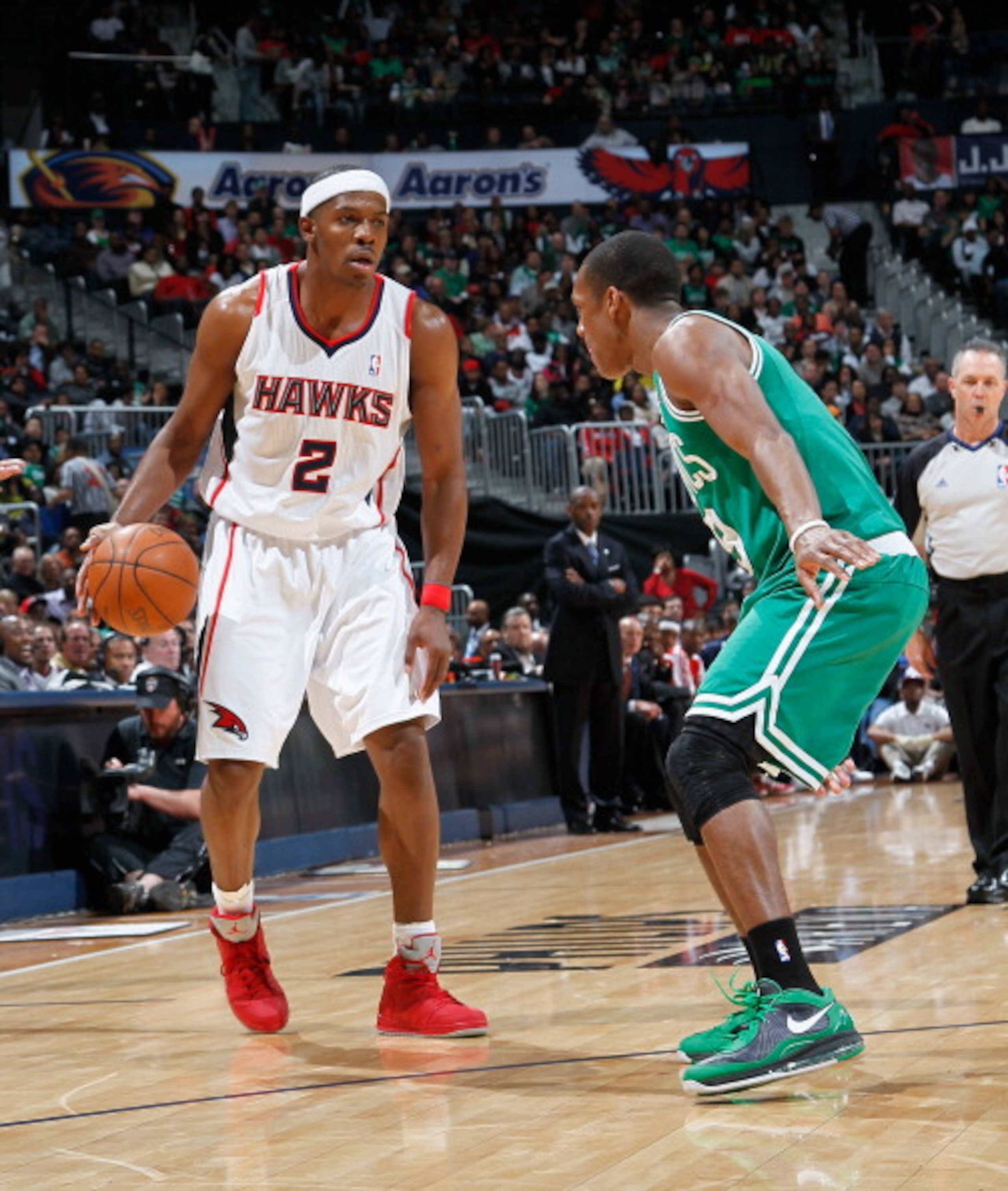 ATLANTA, GA - APRIL 01: Joe Johnson #2 of the Atlanta Hawks against Rajon Rondo #9 of the Boston Celtics at Philips Arena on April 1, 2011 in Atlanta, Georgia. NOTE TO USER: User expressly acknowledges and agrees that, by downloading and/or using this P ATLANTA, GA - APRIL 01: Joe Johnson #2 of the Atlanta Hawks against Rajon Rondo #9 of the Boston Celtics at Philips Arena on April 1, 2011 in Atlanta, Georgia. NOTE TO USER: User expressly acknowledges and agrees that, by downloading and/or using this P