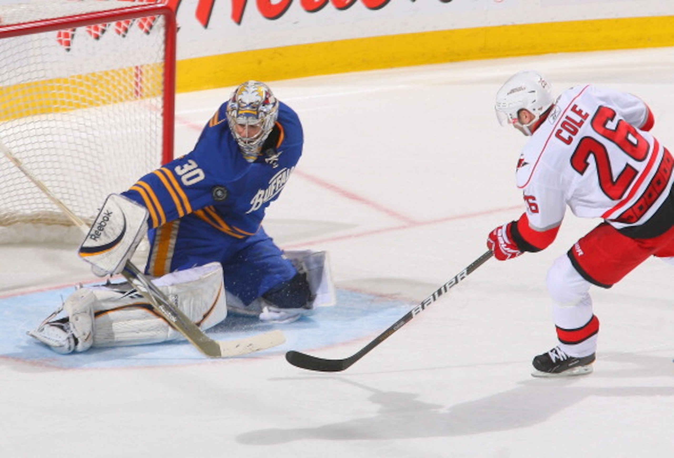 BUFFALO, NY - MARCH 15: Ryan Miller #30 of the Buffalo Sabres makes a save on a breakaway by Erik Cole #26 of the Carolina Hurricanes at HSBC Arena on March 15, 2011 in Buffalo, New York. Carolina won 1-0. (Photo by Rick Stewart/Getty Images) BUFFALO, NY - MARCH 15: Ryan Miller #30 of the Buffalo Sabres makes a save on a breakaway by Erik Cole #26 of the Carolina Hurricanes at HSBC Arena on March 15, 2011 in Buffalo, New York. Carolina won 1-0. (Photo by Rick Stewart/Getty Images)