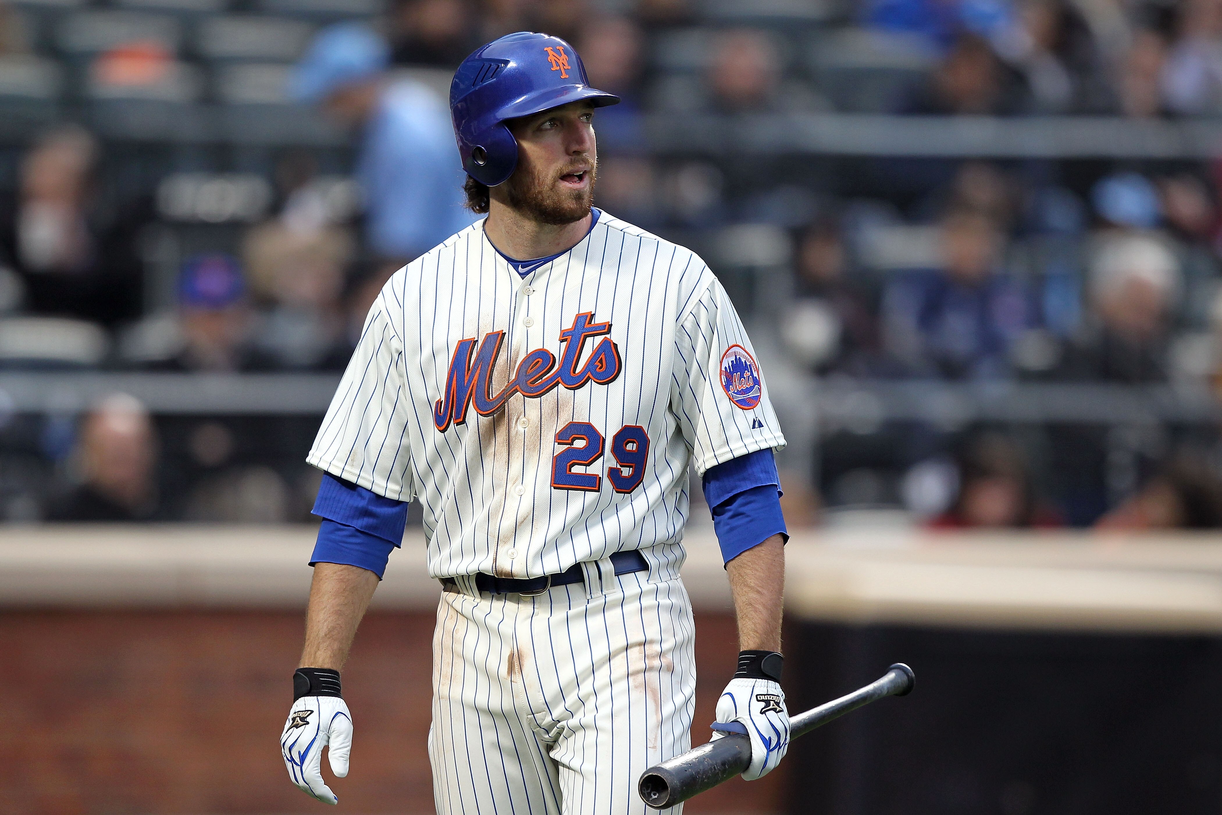 NEW YORK, NY - APRIL 08:  Ike Davis #29 of the New York Mets reacts after he struck out in the bottom of the sixth inning against the Washington Nationals during the Mets' Home Opener at Citi Field on April 8, 2011 in the Flushing neighborhood of Queens i