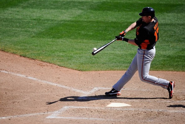 PEORIA, AZ - MARCH 08: Aubrey Huff #17 of the San Francisco Giants hits a deep fly out against Seattle Marinerr during the spring training baseball game against at Peoria Stadium on March 8, 2011 in Peoria, Arizona.  (Photo by Kevork Djansezian/Getty Imag