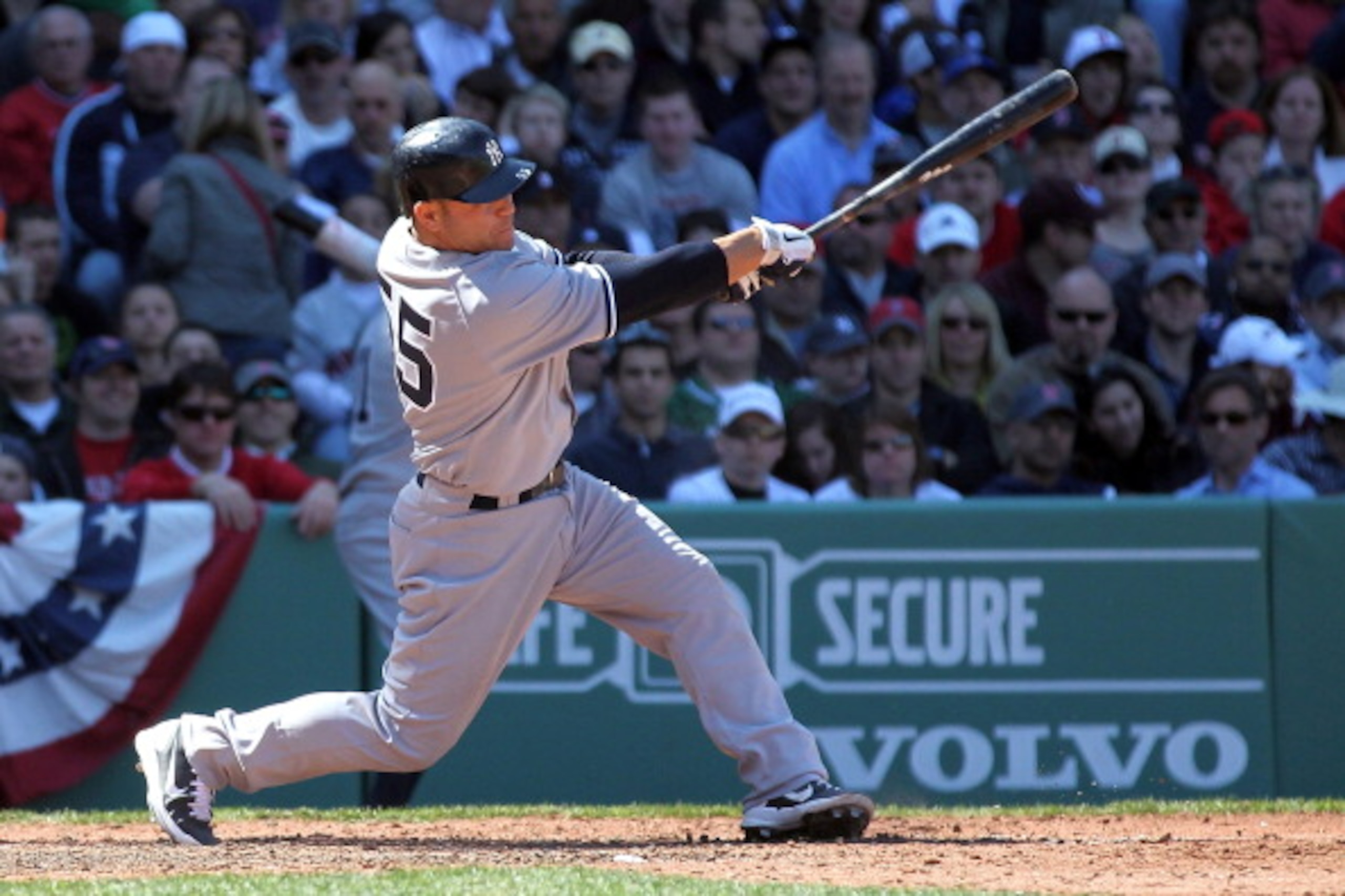BOSTON, MA - APRIL 9:  Russell Martin #55 of the New York Yankees connects for a three-run home run against the Boston Red Sox in the first inning at Fenway Park April 9, 2011 in Boston, Massachusetts. (Photo by Jim Rogash/Getty Images)