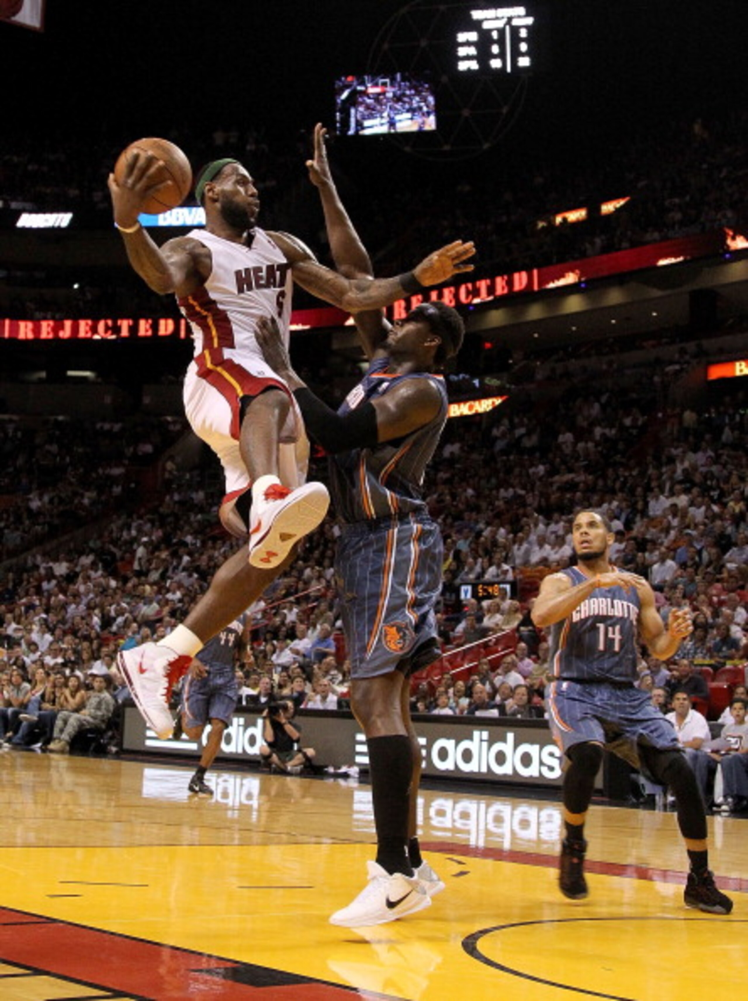 MIAMI, FL - APRIL 08:  LeBron James #6 of the Miami Heat drives against Kwame Brown #54 of the Charlotte Bobcats during a game at American Airlines Arena on April 8, 2011 in Miami, Florida. NOTE TO USER: User expressly acknowledges and agrees that, by dow