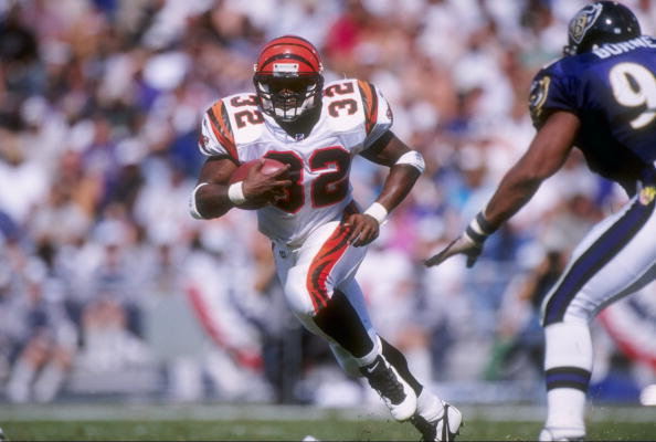 7 Sep 1997:  Running back Ki-Jana Carter #32 of the Cincinnati Bengals carries the football during the Bengals 23-10 win over the Baltimore Ravens at Memorial Stadium in Baltimore, Maryland. Mandatory Credit: Doug Pensinger  /Allsport